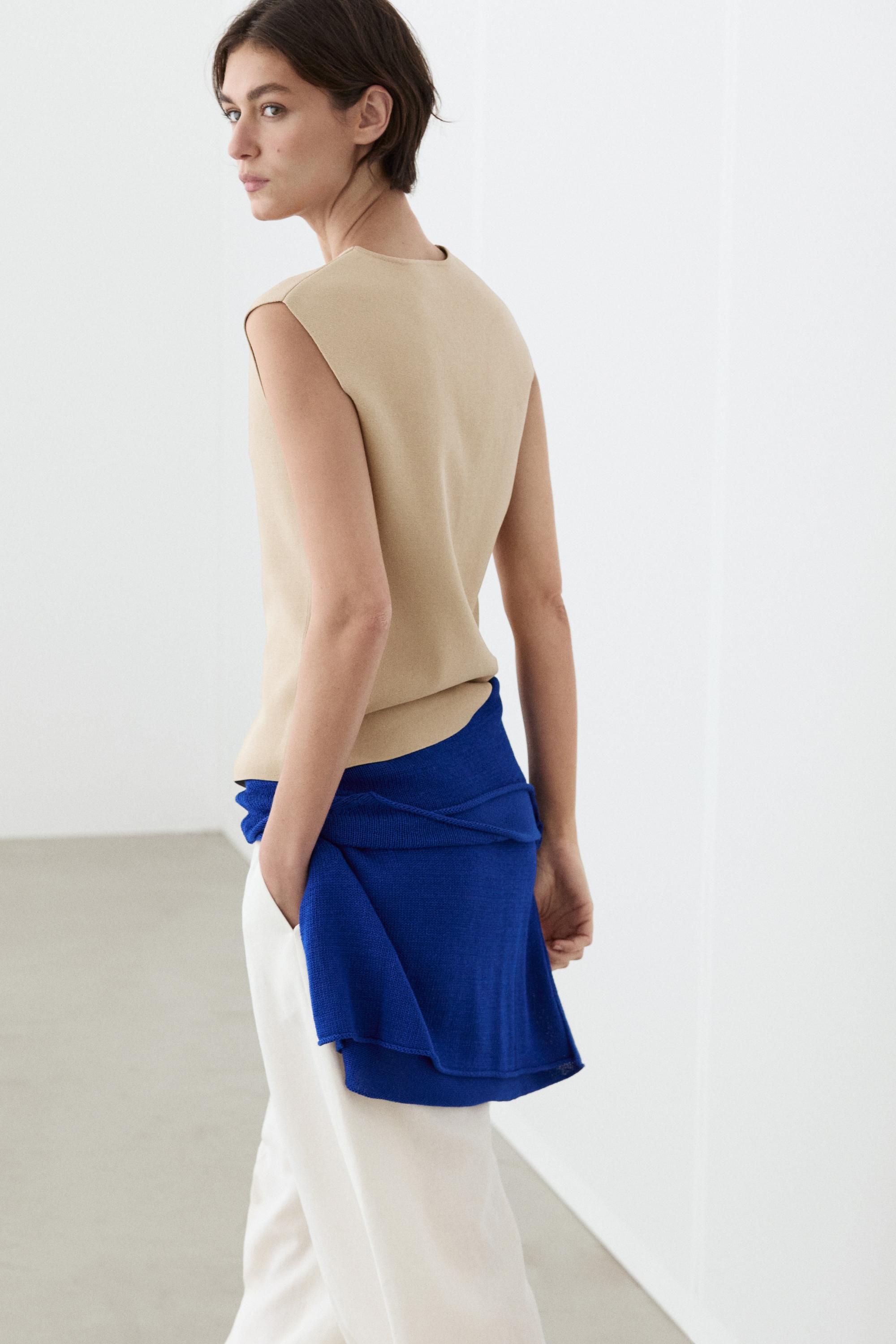 Knit waistcoat with button details — BEIGE