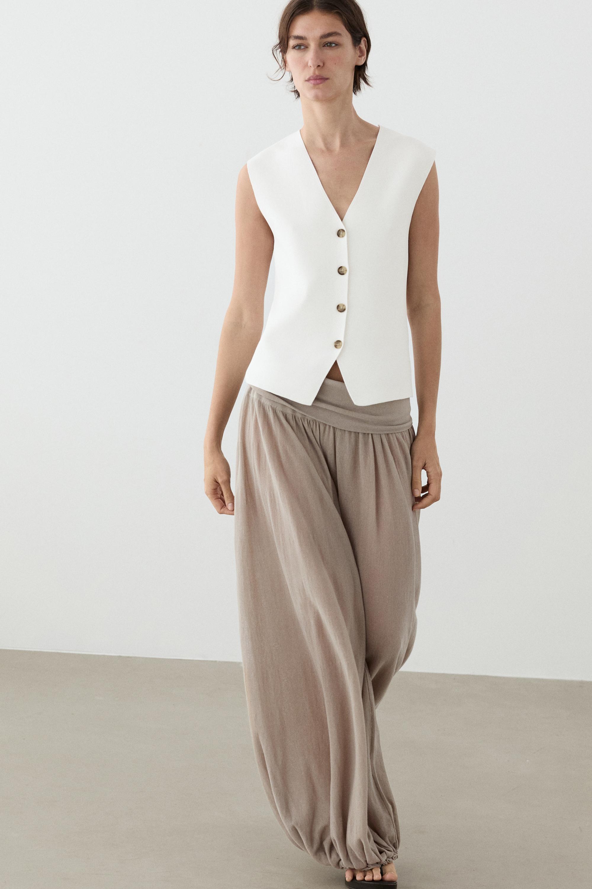 Knit waistcoat with button details — WHITE