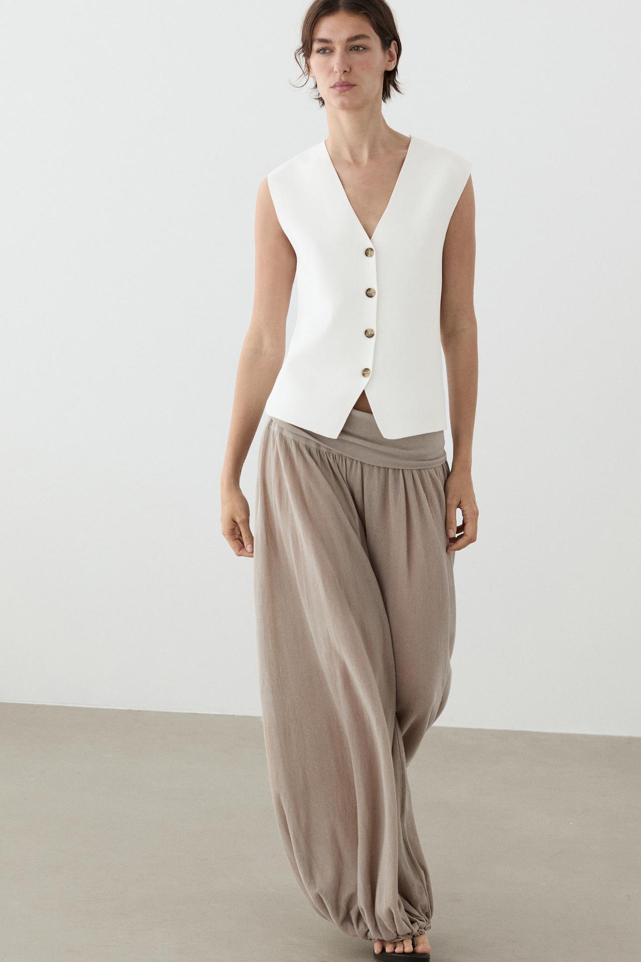 Knit waistcoat with button details — WHITE