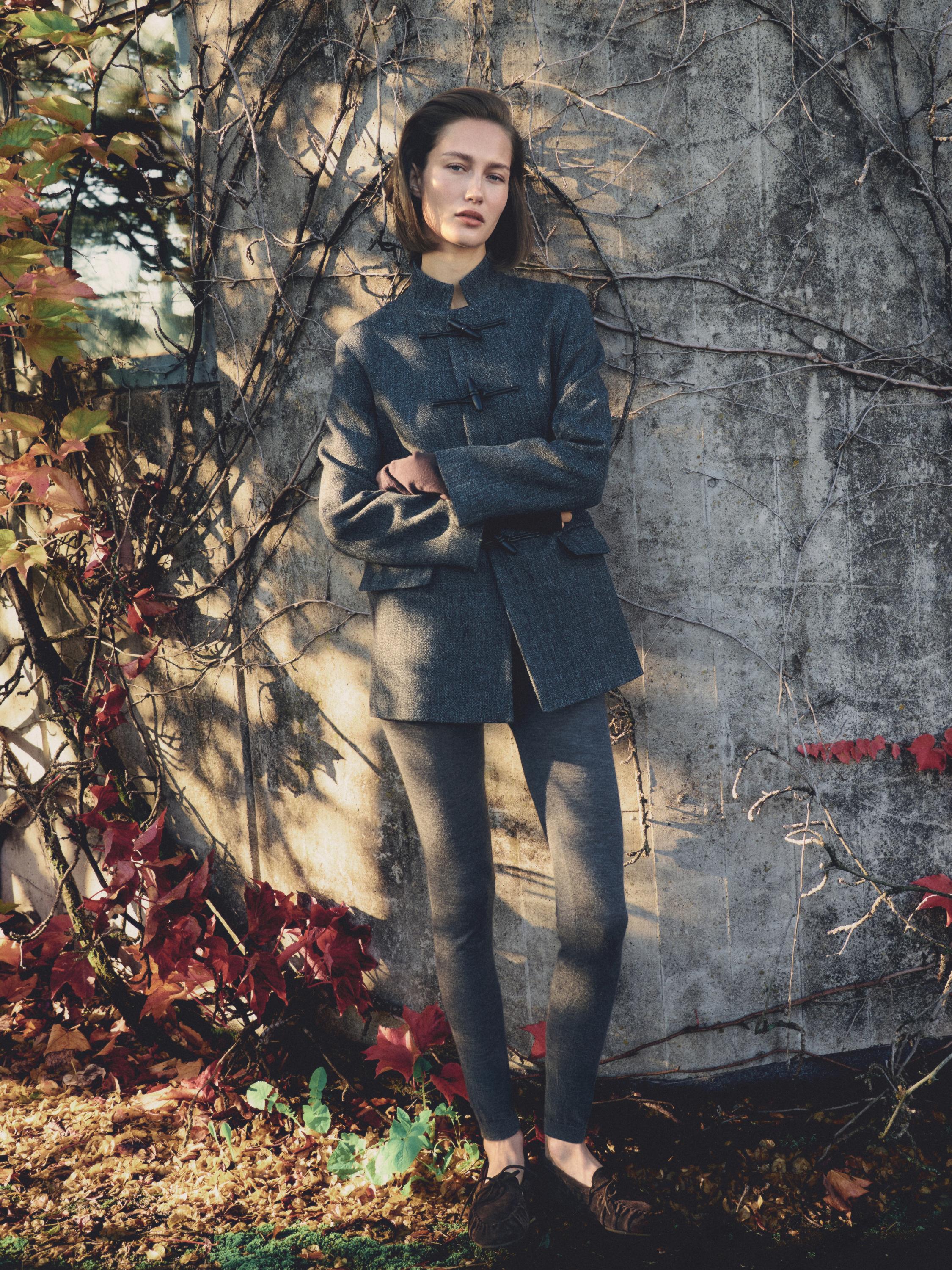 Mid-length coat with horn toggle