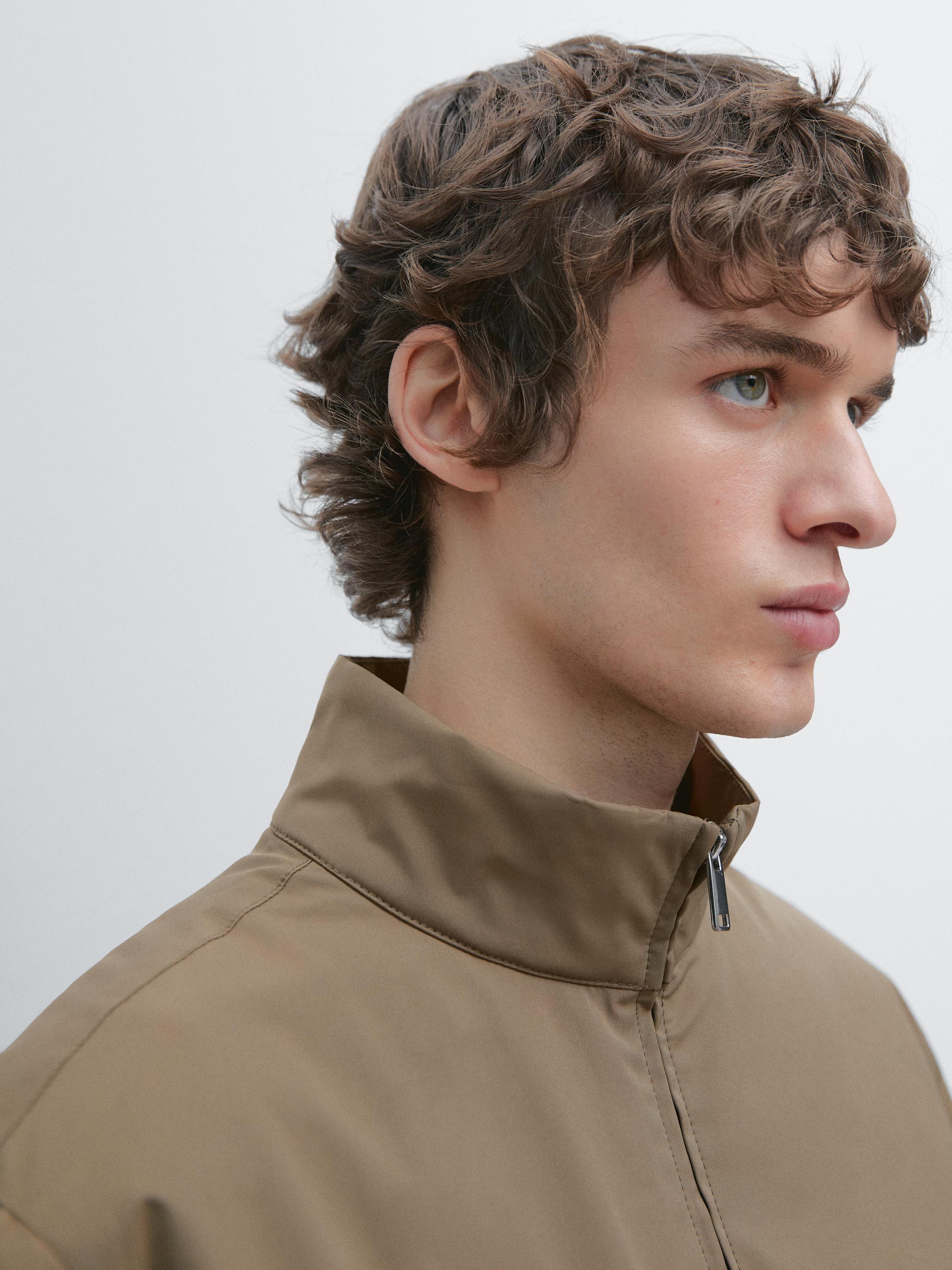 Yüksek yaka su itici şişme mont