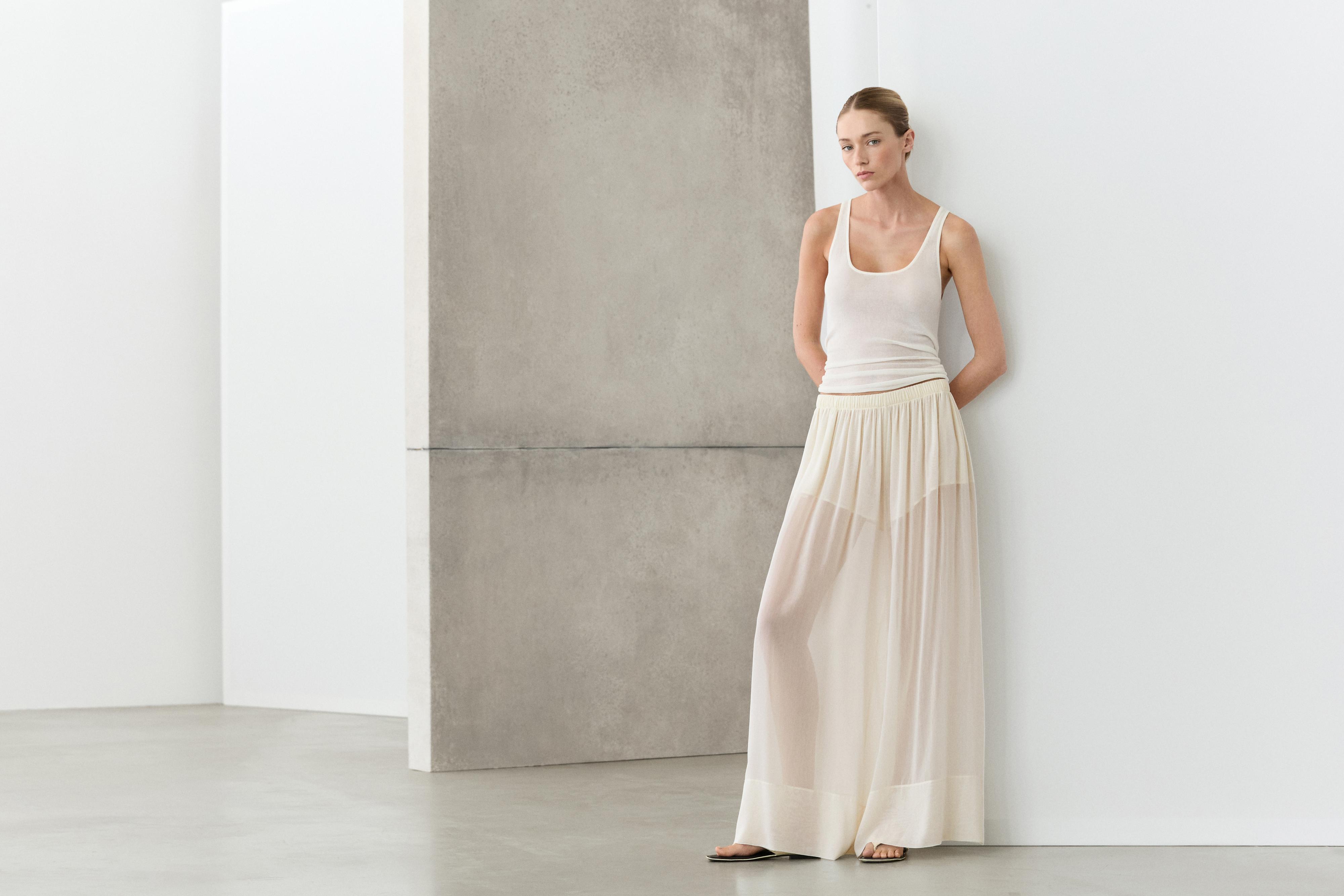 Semi-sheer flowing wide-leg pants — Off white