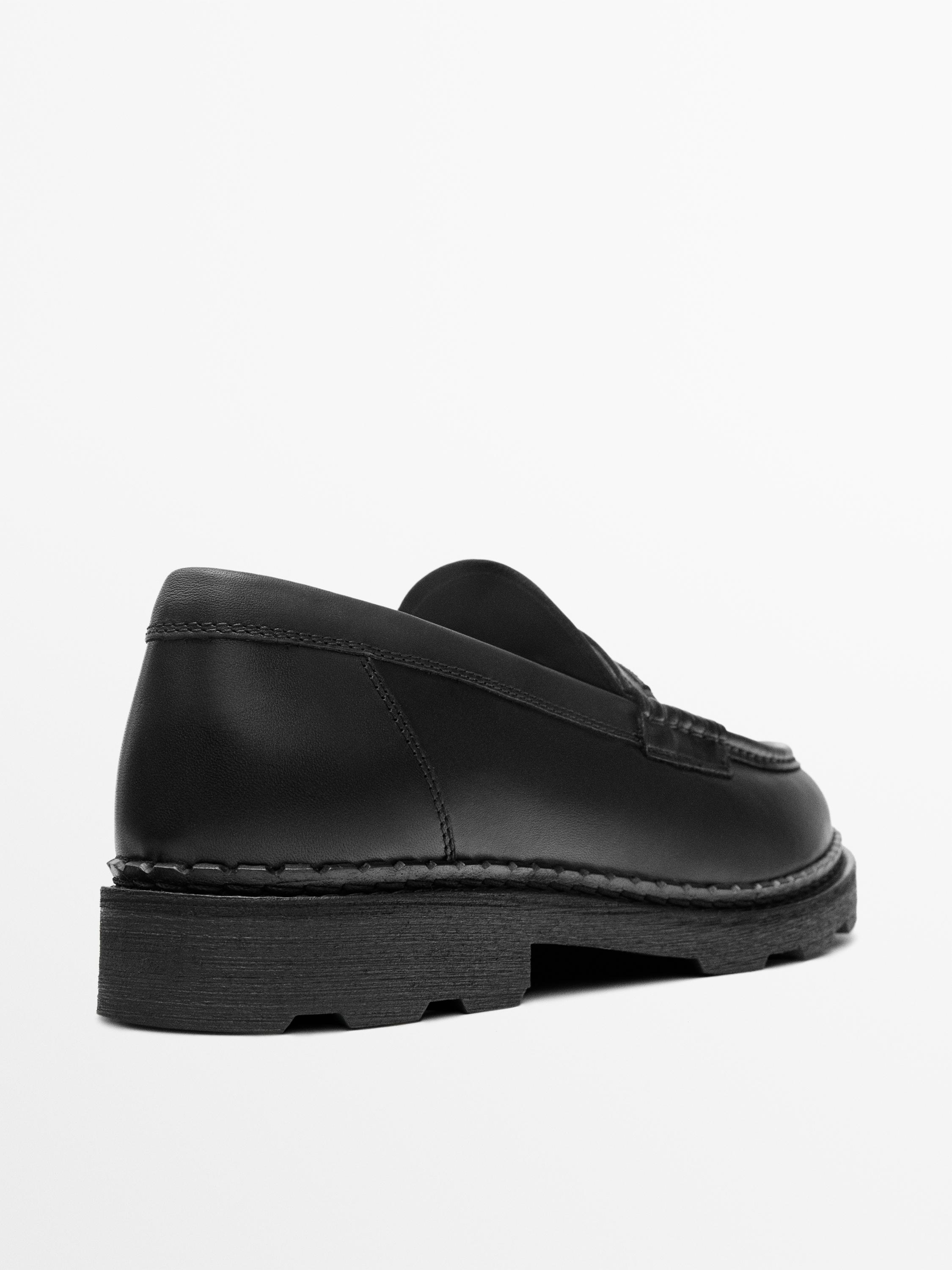 Leather track-sole loafers with penny strap — BLACK