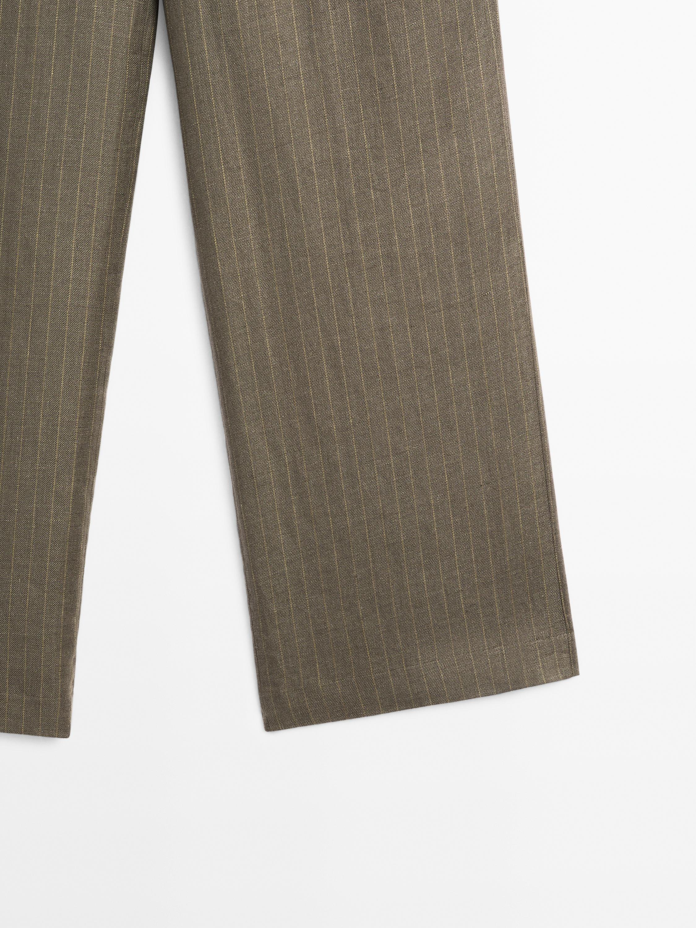 100% linen striped trousers with buckle detail