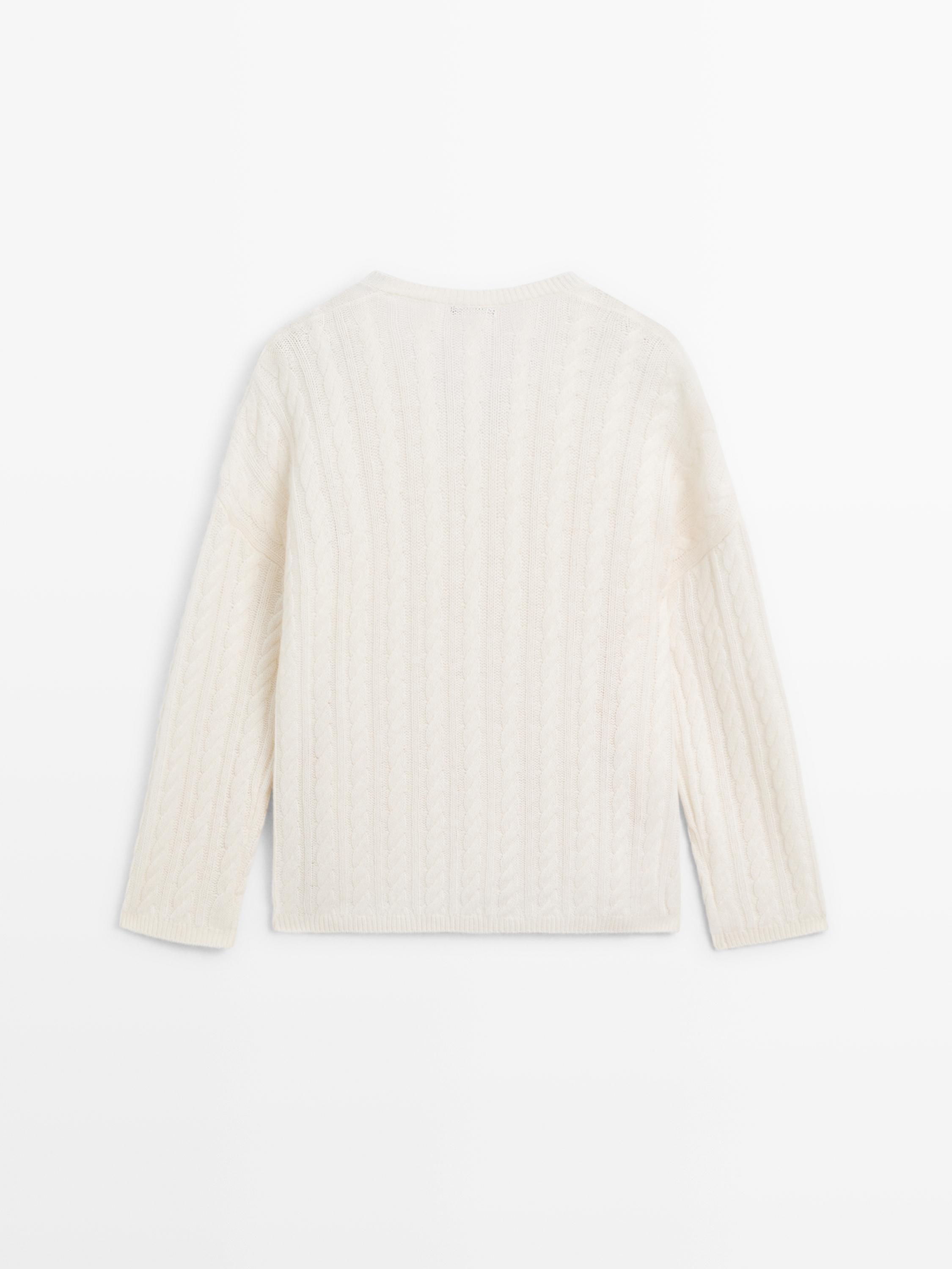 Jersey trenzado cuello pico