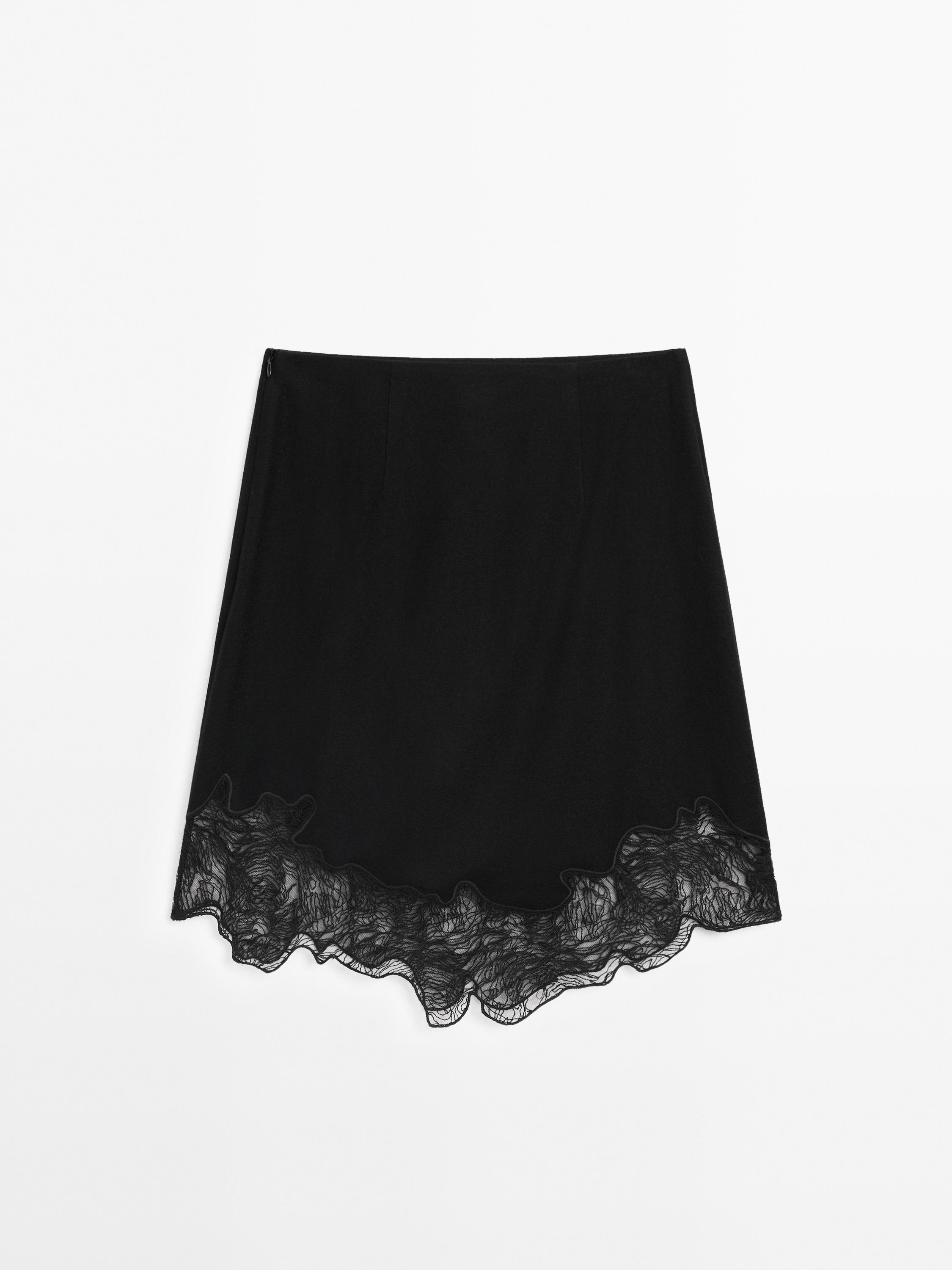 Short asymmetric lace-trimmed skirt