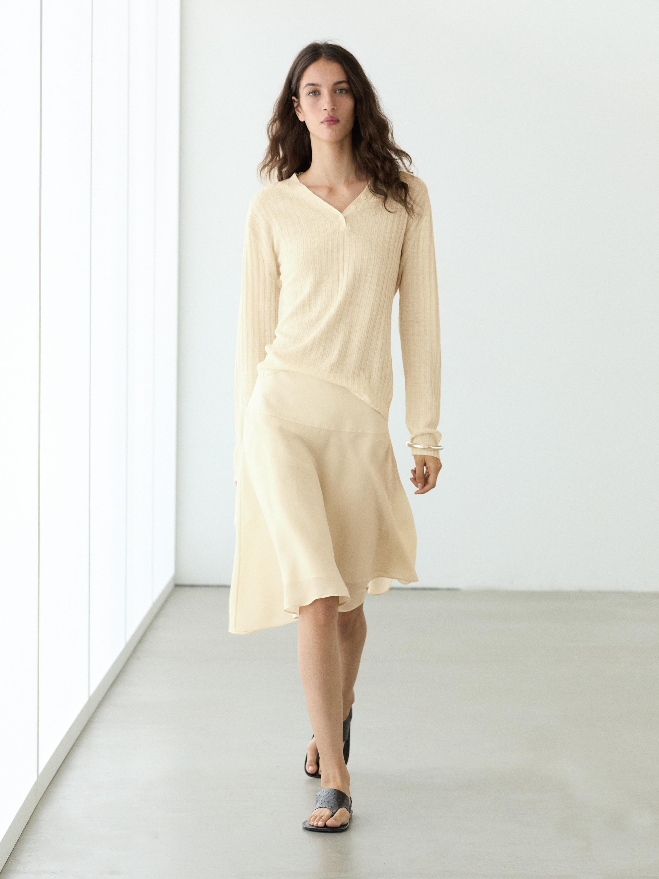 Flowing asymmetric midi skirt