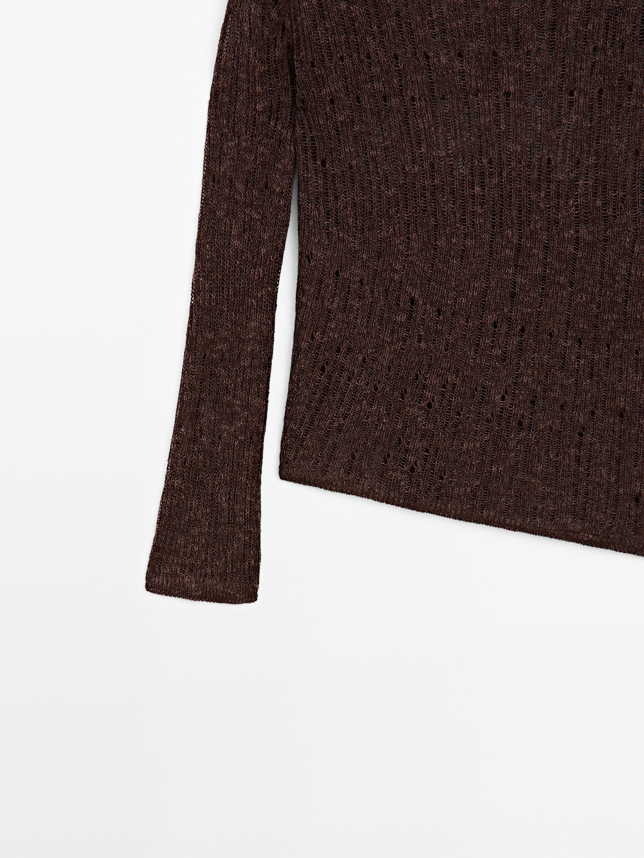 Asymmetric cutwork sweater