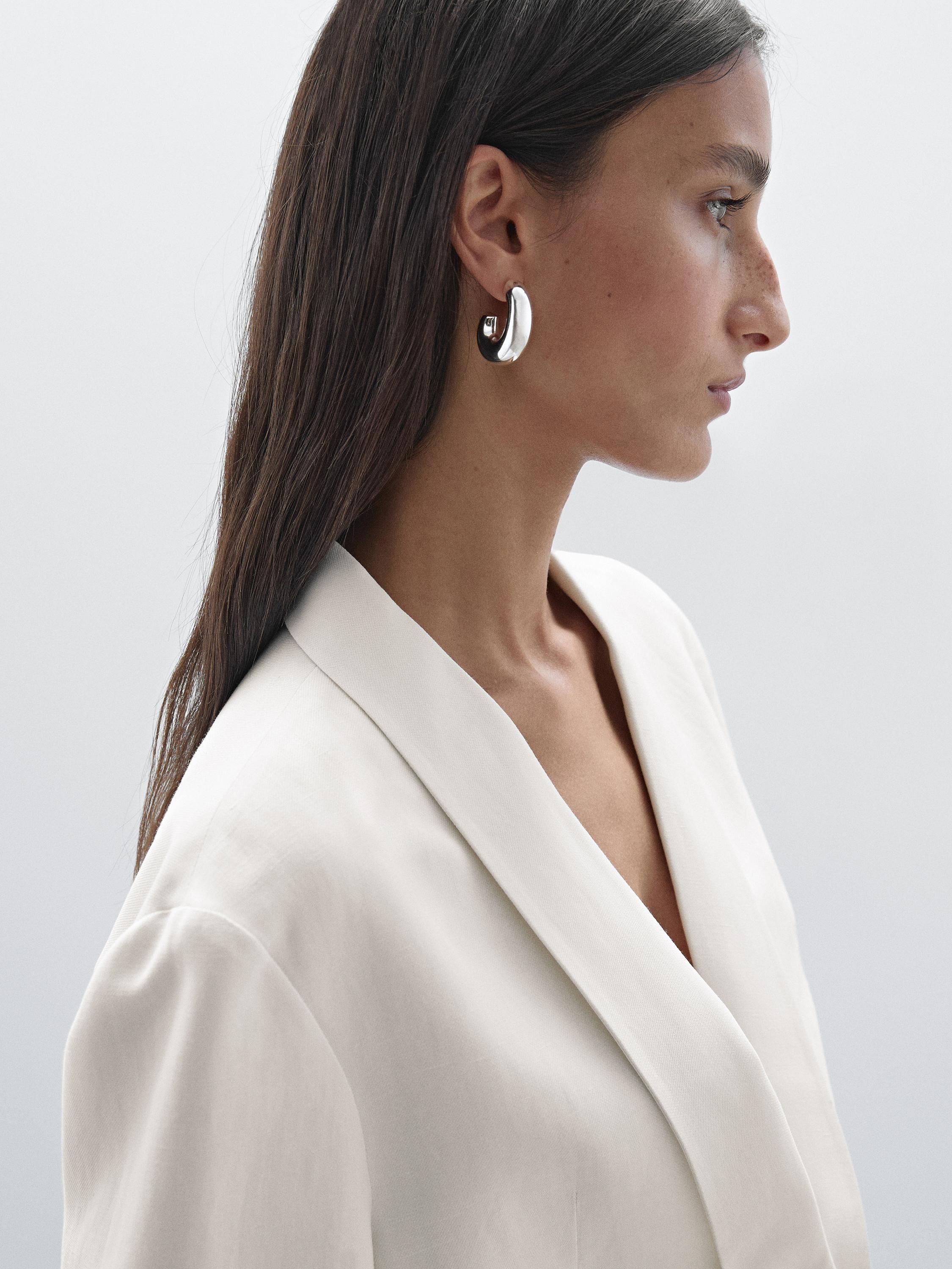 Suit blazer with tie detail in contrast fabric