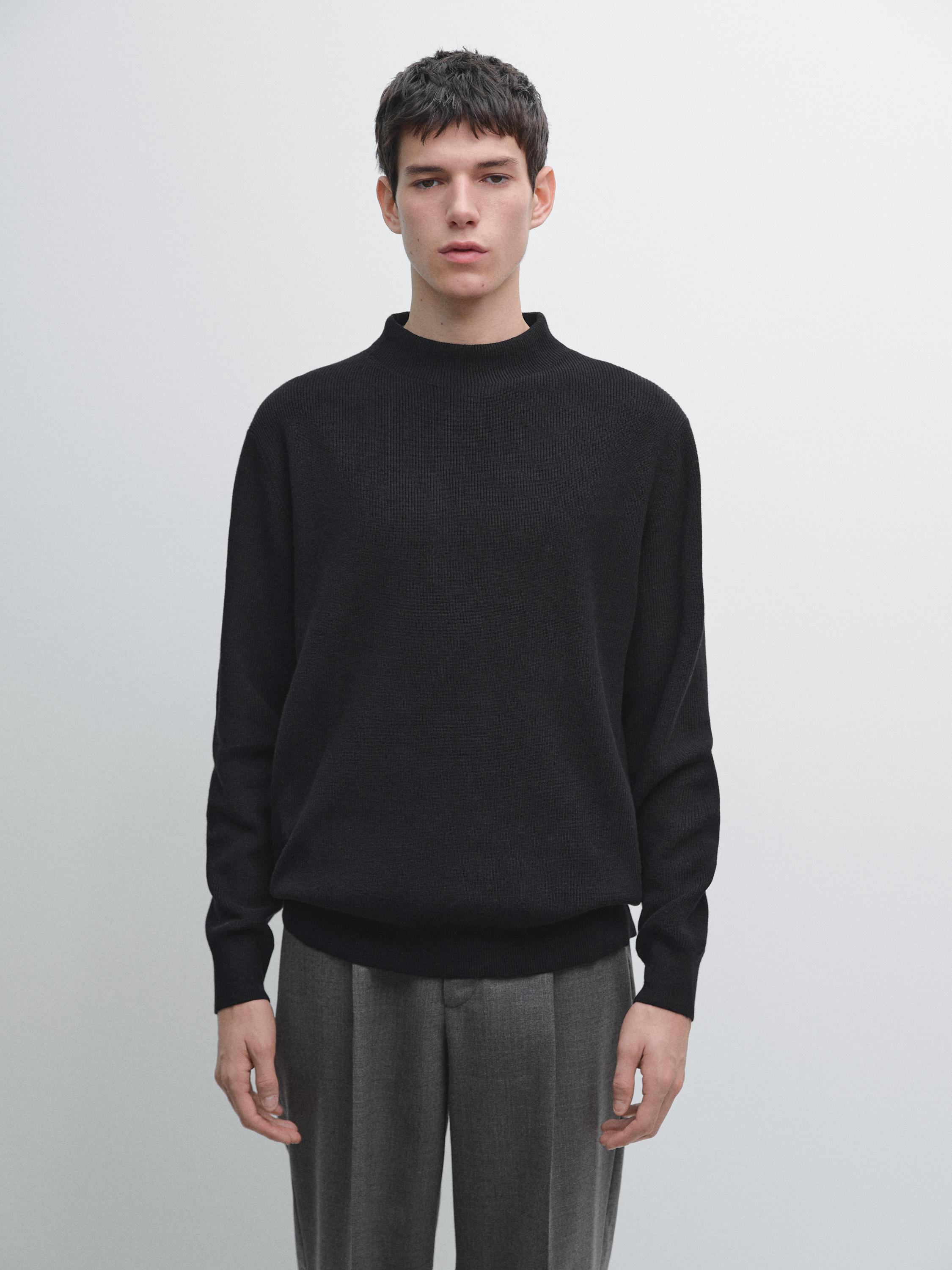 Sweter rajut campuran katun dengan leher tinggi