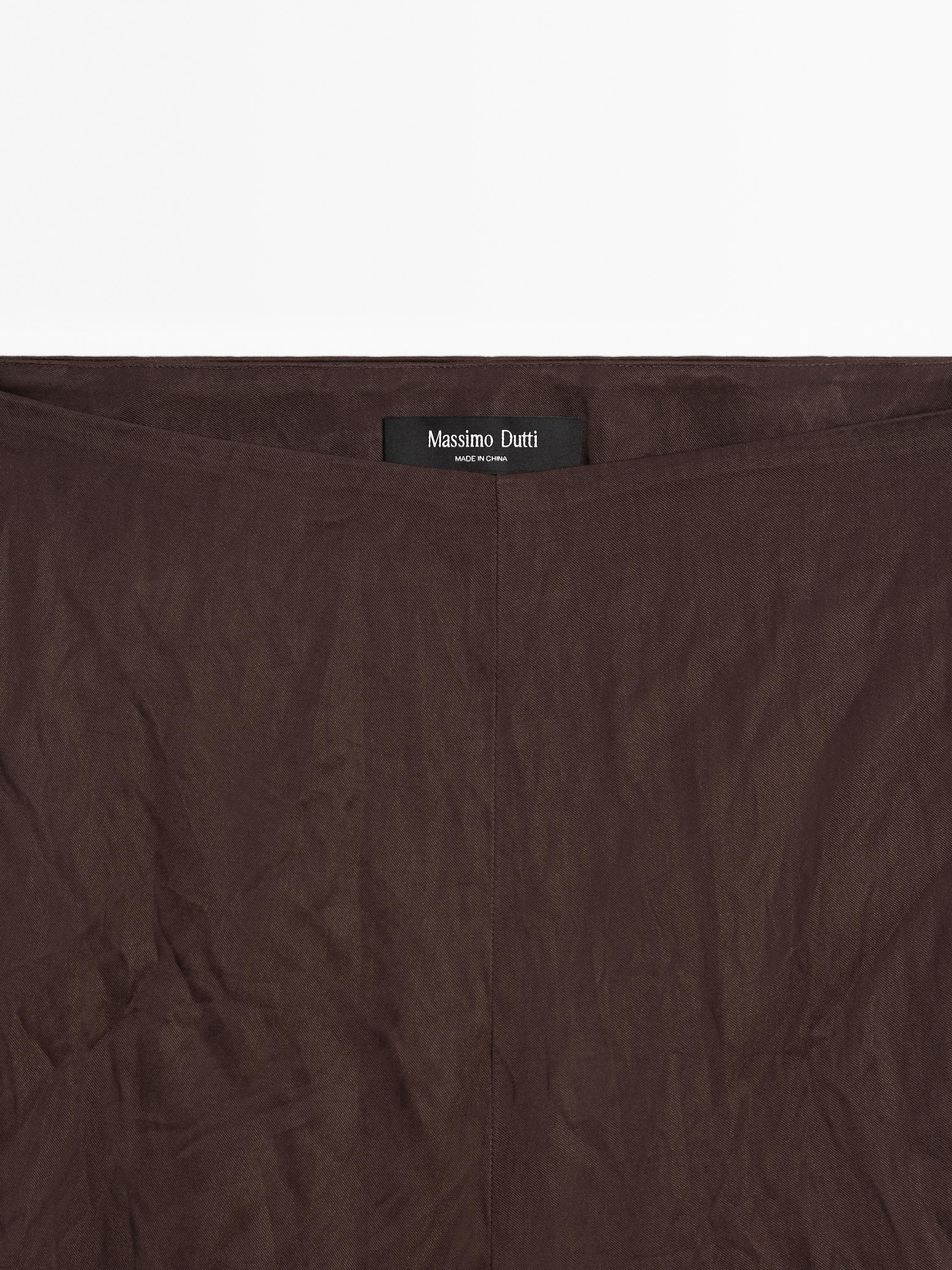 Capri trousers with blonde lace detail