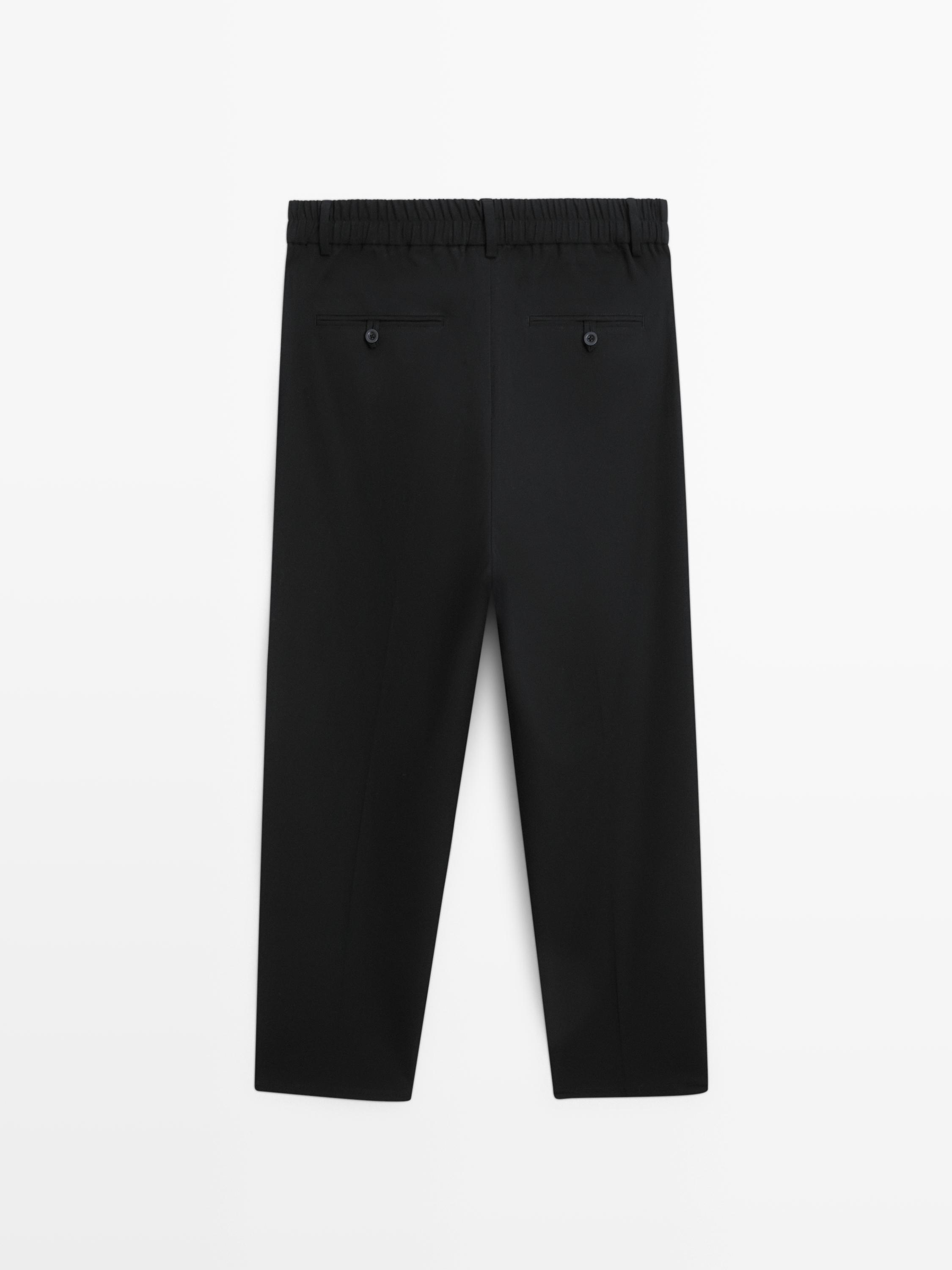 Relaxed fit darted trousers