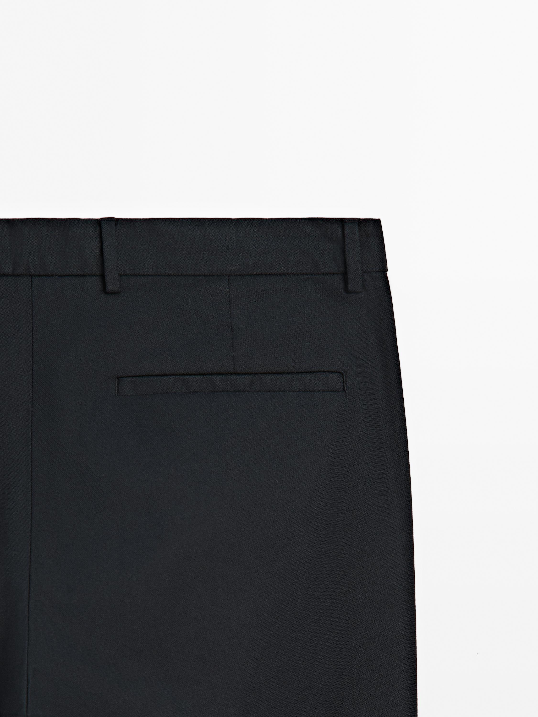 Slim fit textured trousers