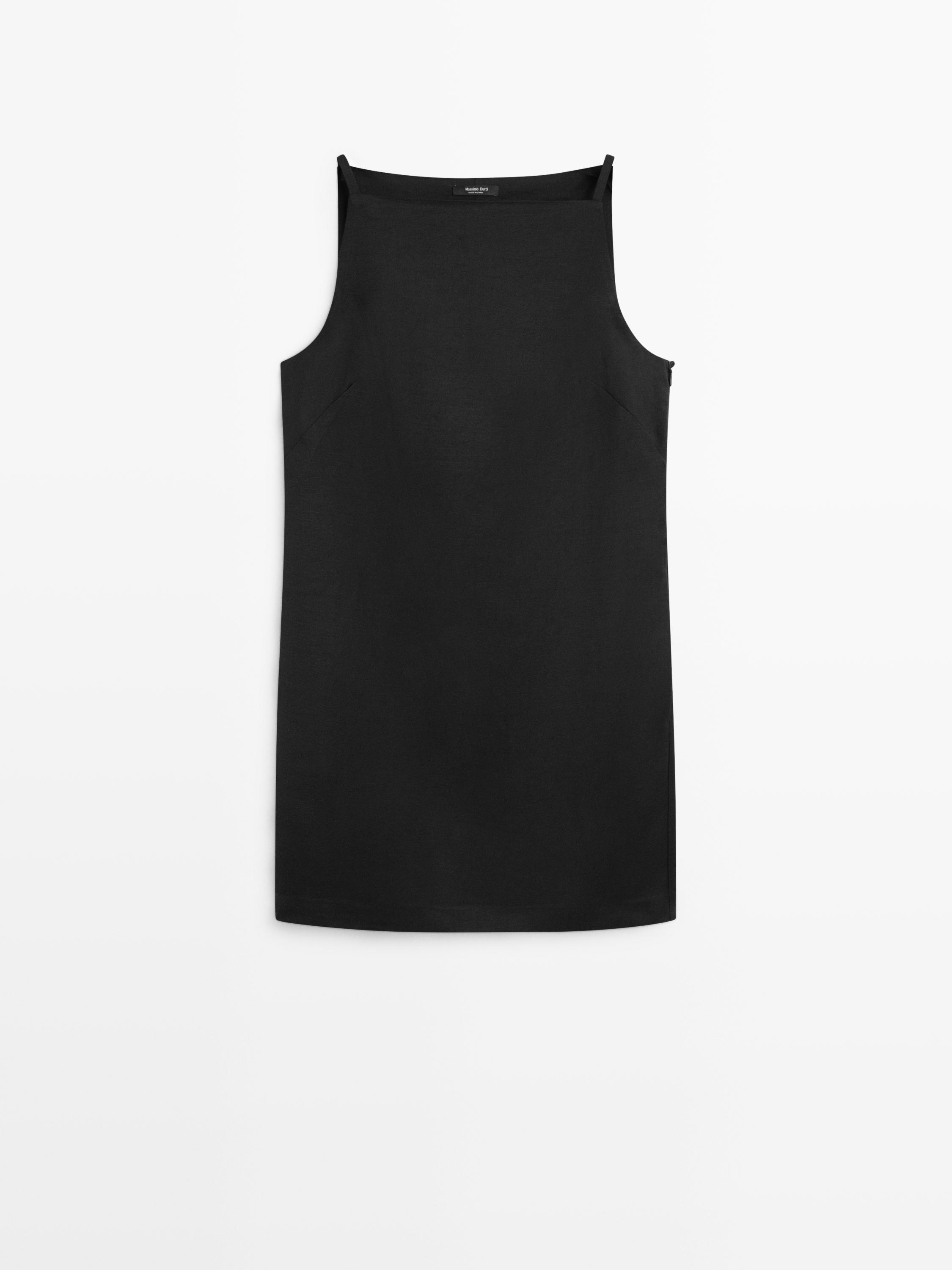 Front view of a black sleeveless mini dress, straight cut, and square neckline.