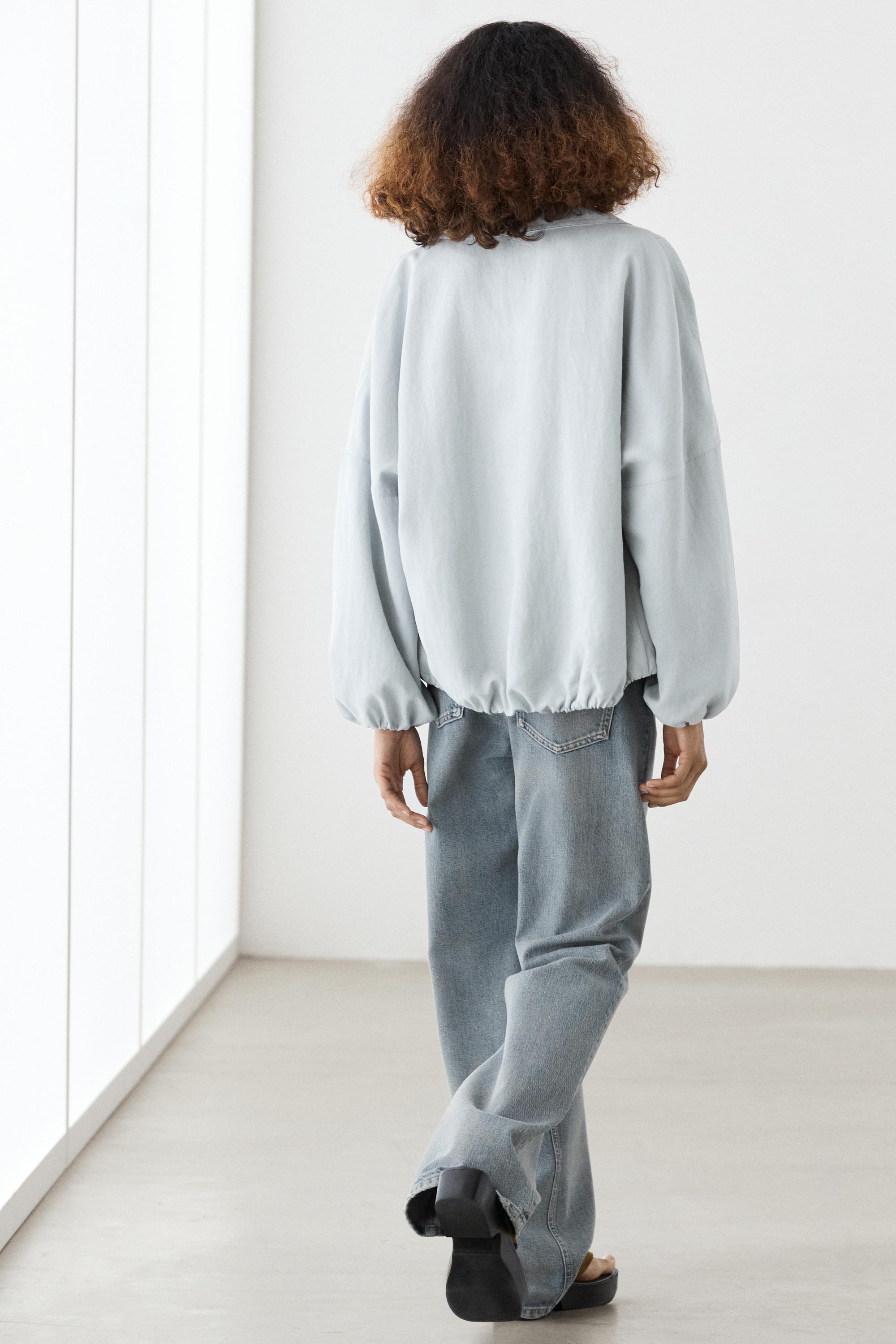 High collar bomber jacket with pocket details — Light blue