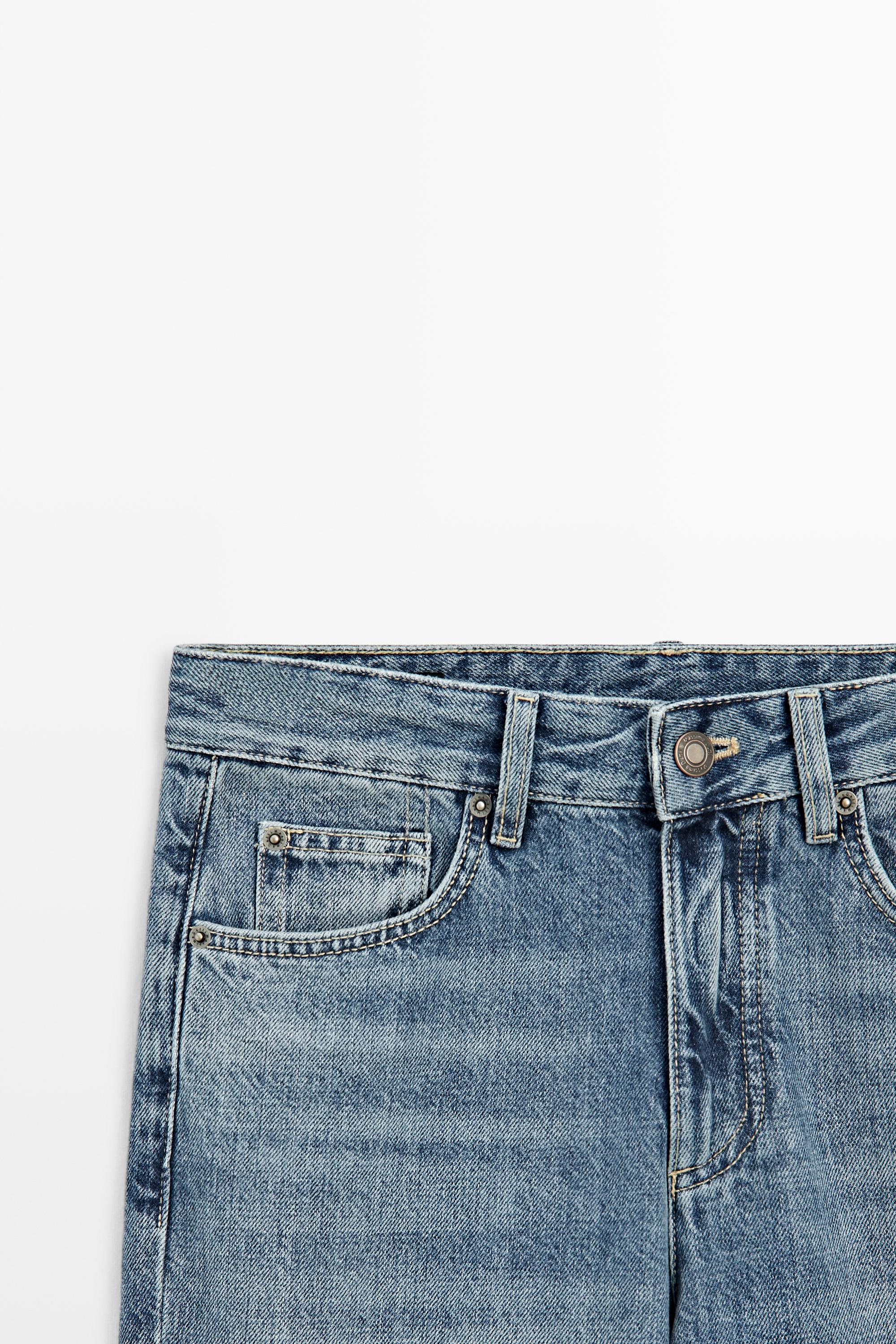 Quần jeans lửng dáng quả chuông cạp vừa