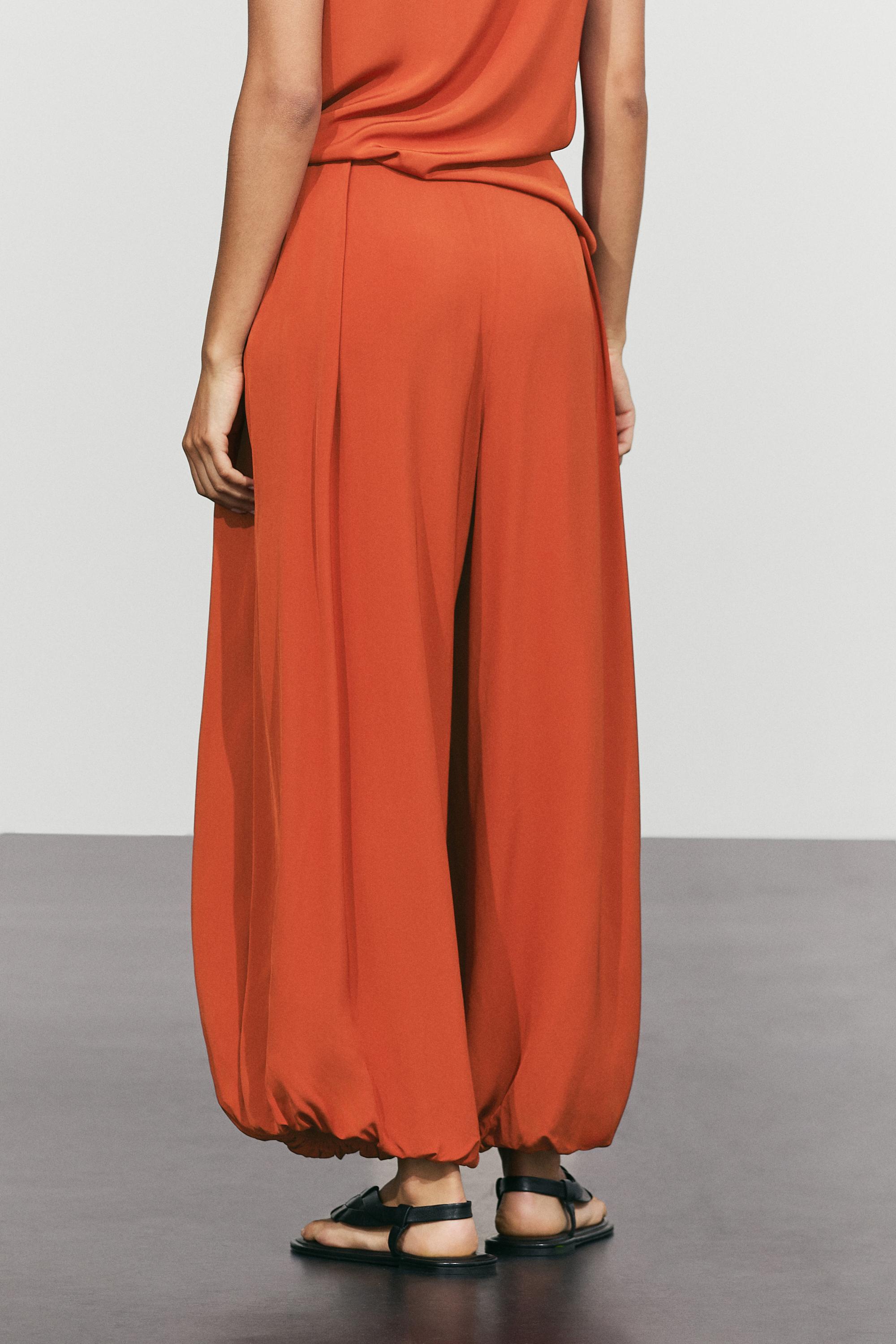 Pleated sarouel trousers total look — TERRA-COTTA