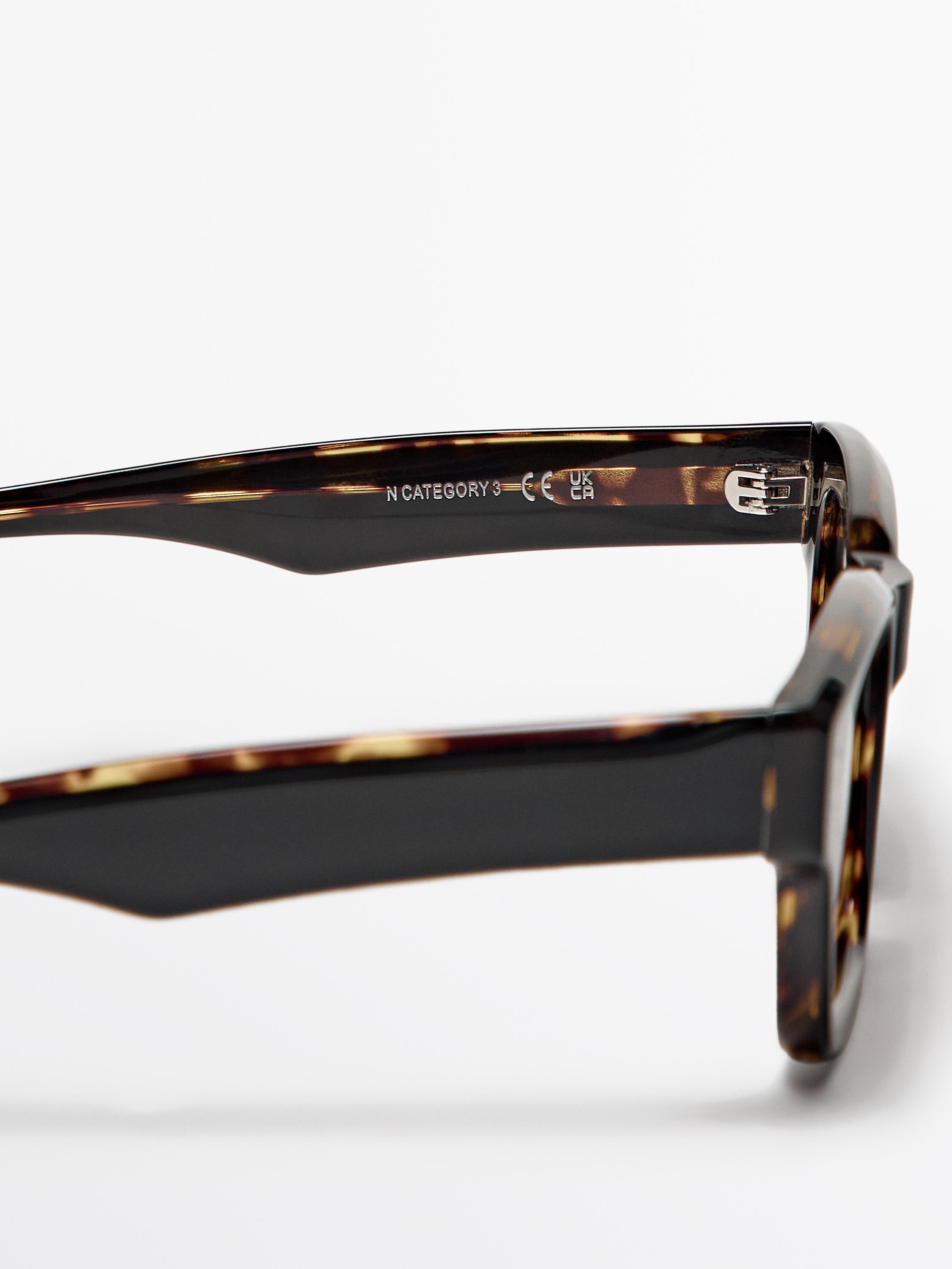 Narrow tortoiseshell-effect sunglasses