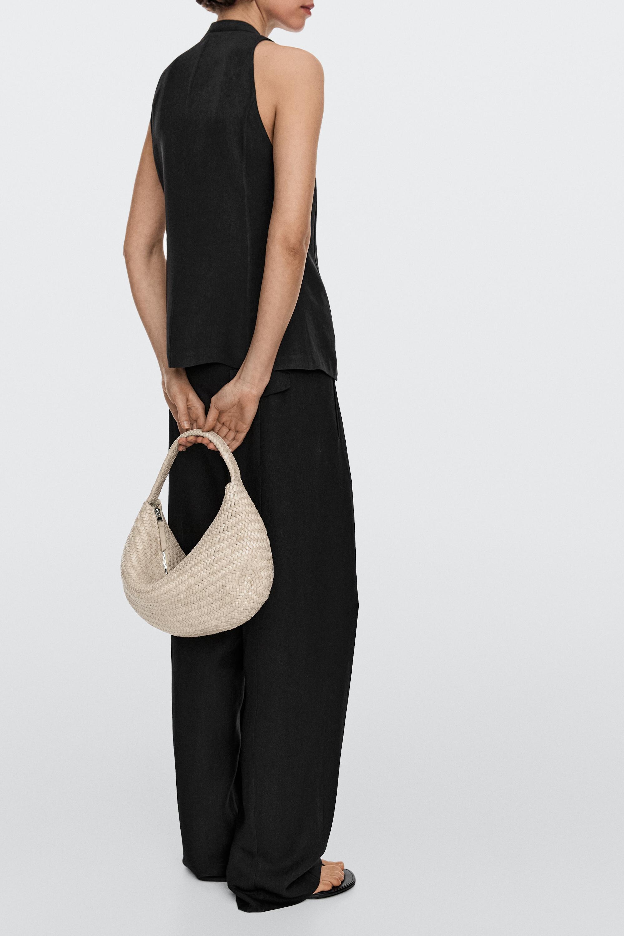 Braided leather half-moon bag — CREAM