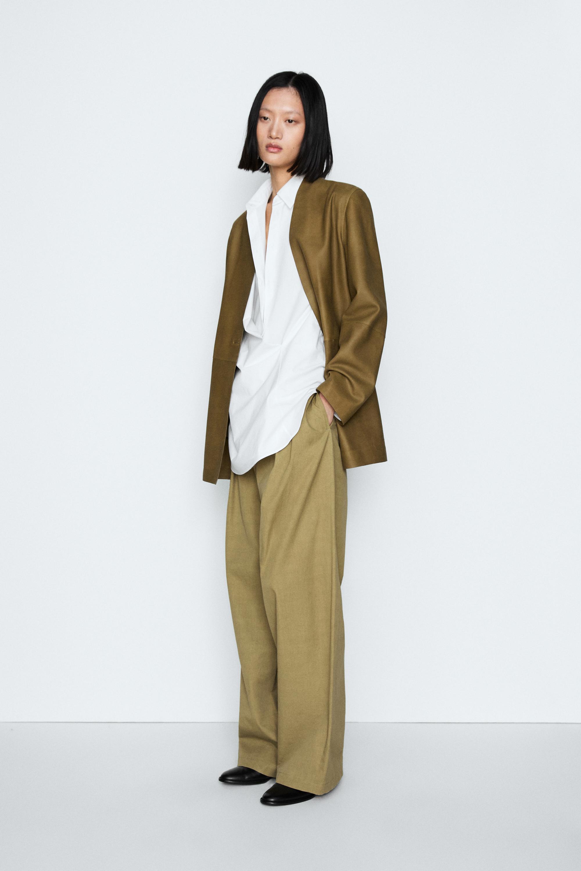 Pleated pants with crossover fastening detail - STUDIO — KHAKI