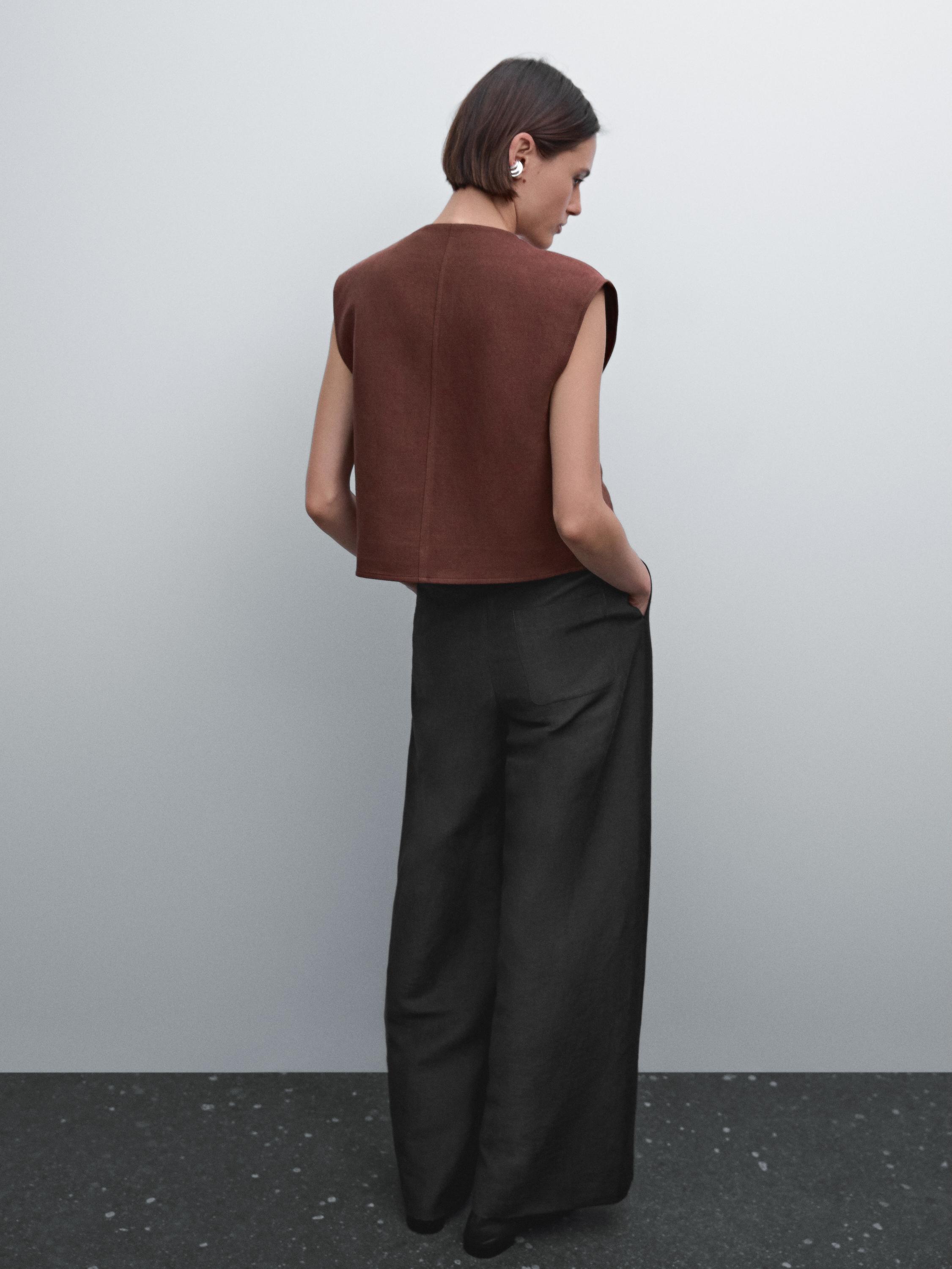 Flowing wide-leg trousers with seam details