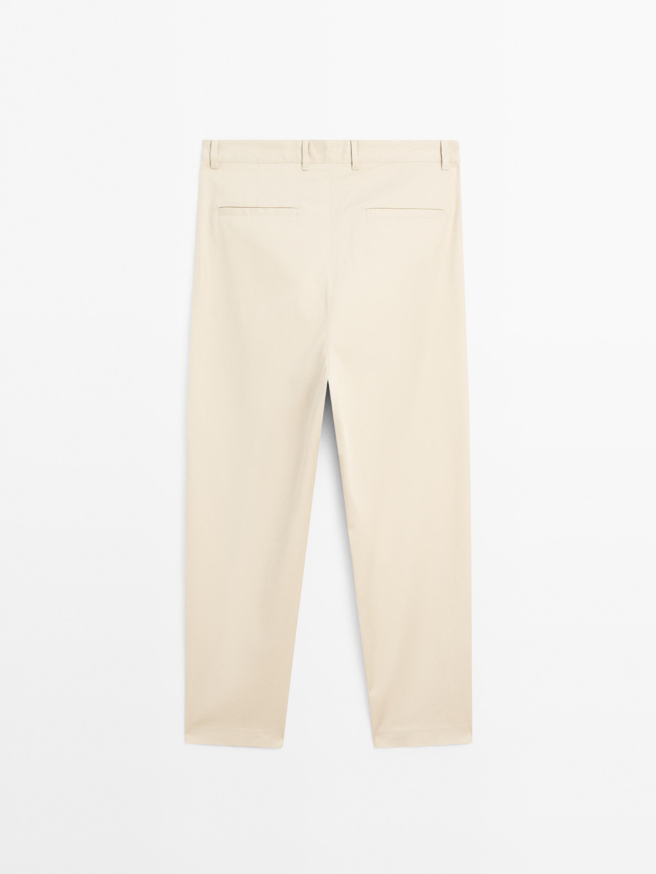 Pantalón straight fit detalle pinza