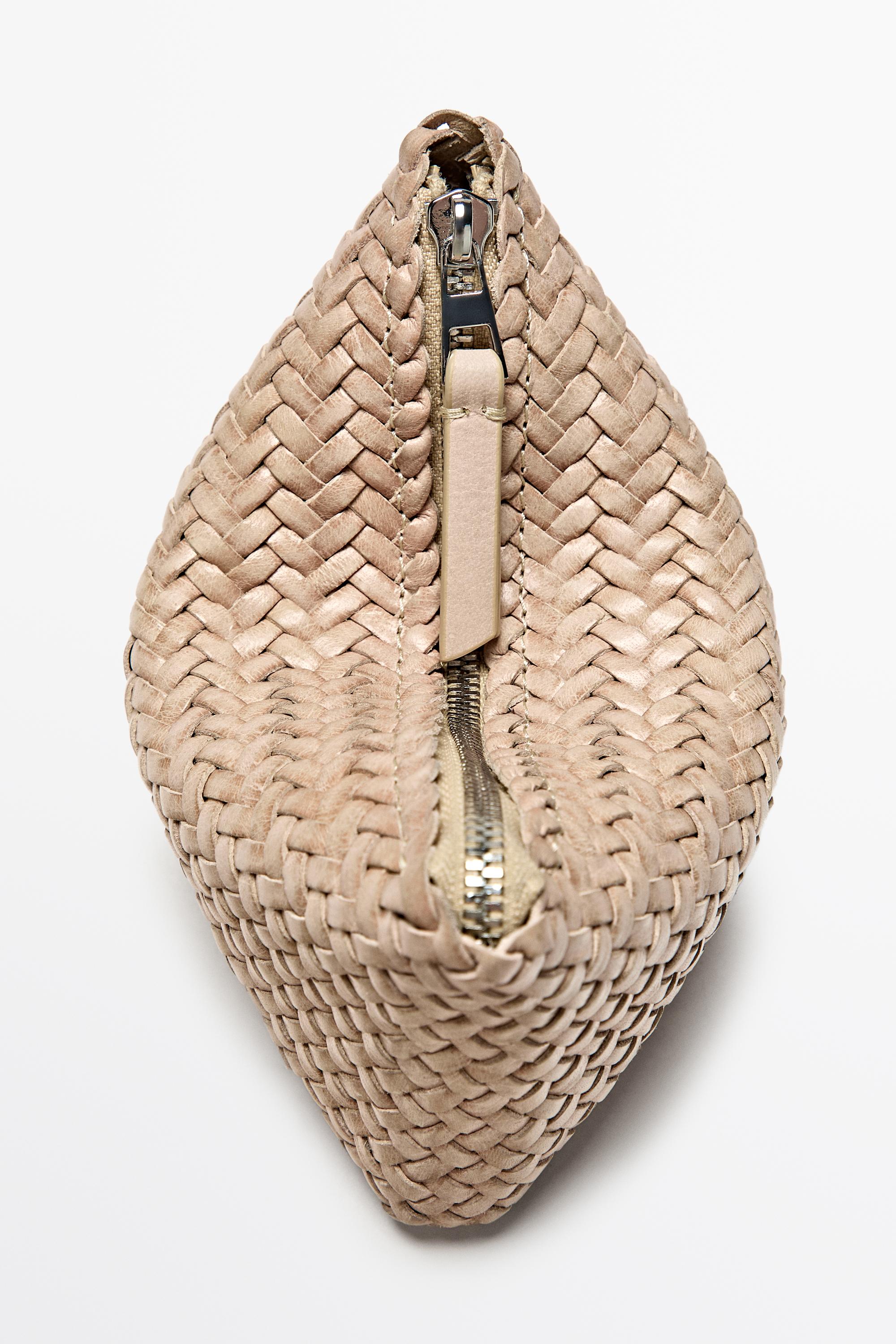 Braided nappa leather pouch bag — CREAM