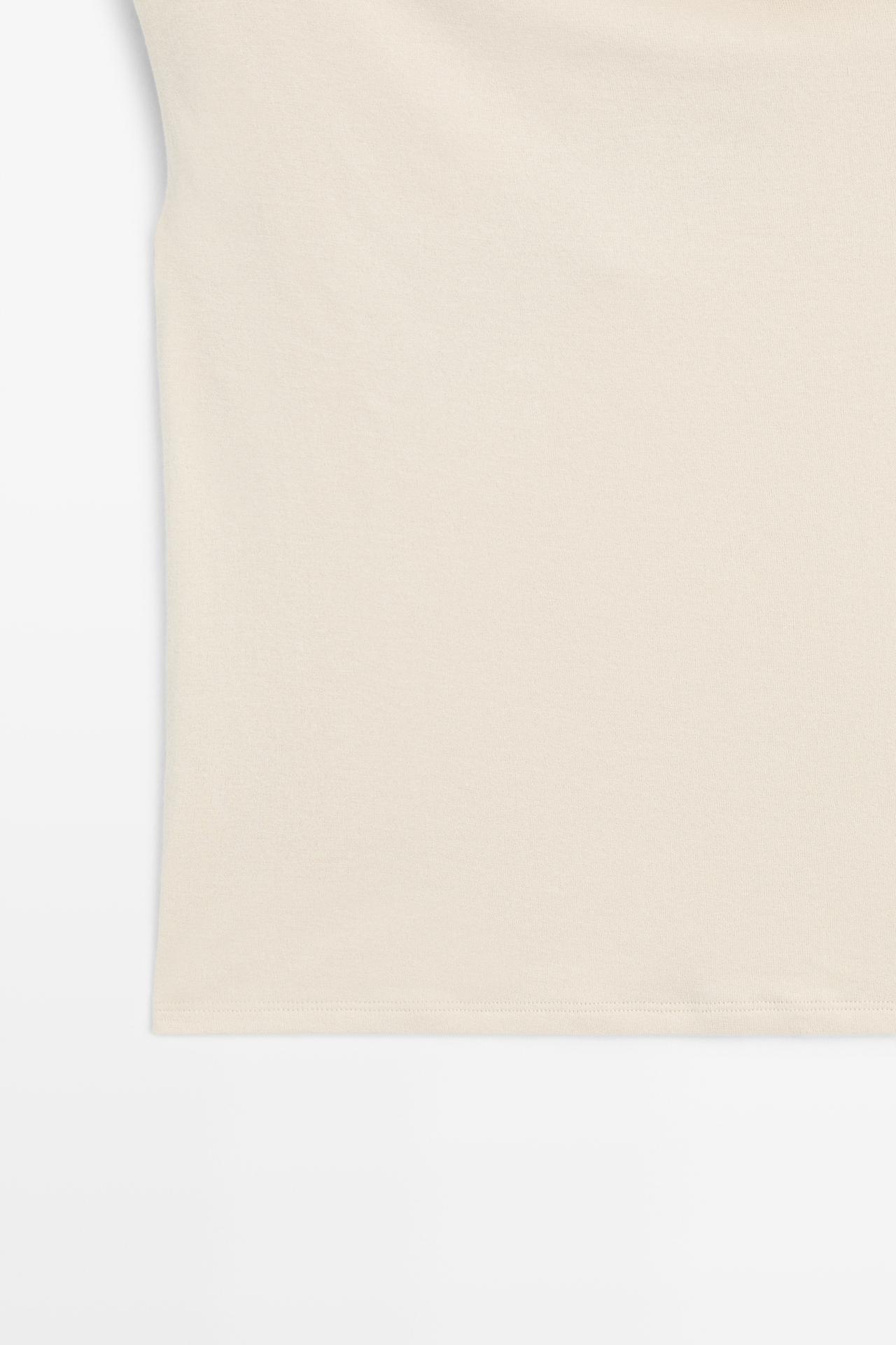 Asymmetric drop sleeve top — SAND