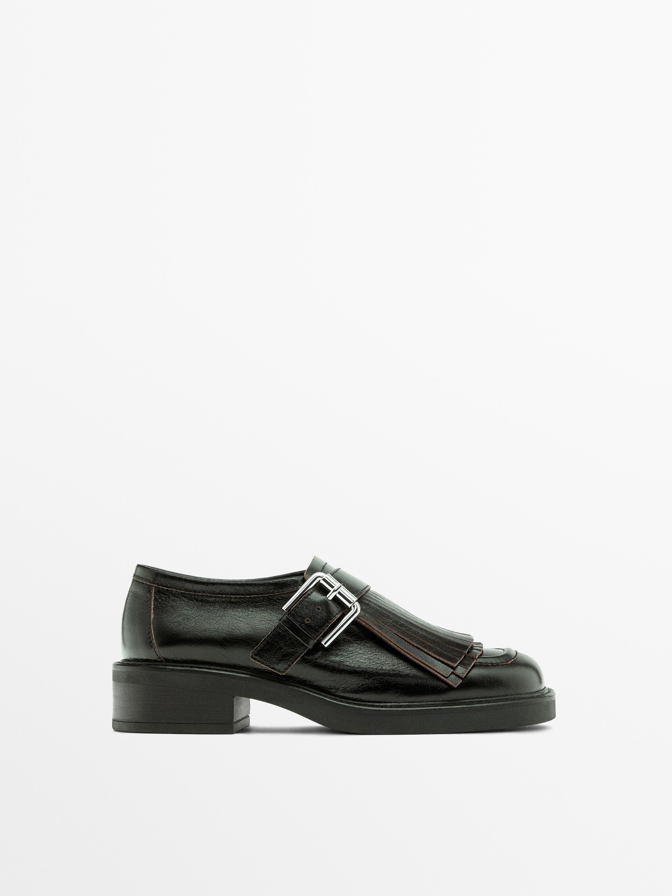 Buckled derby shoes with fringe — BLACK