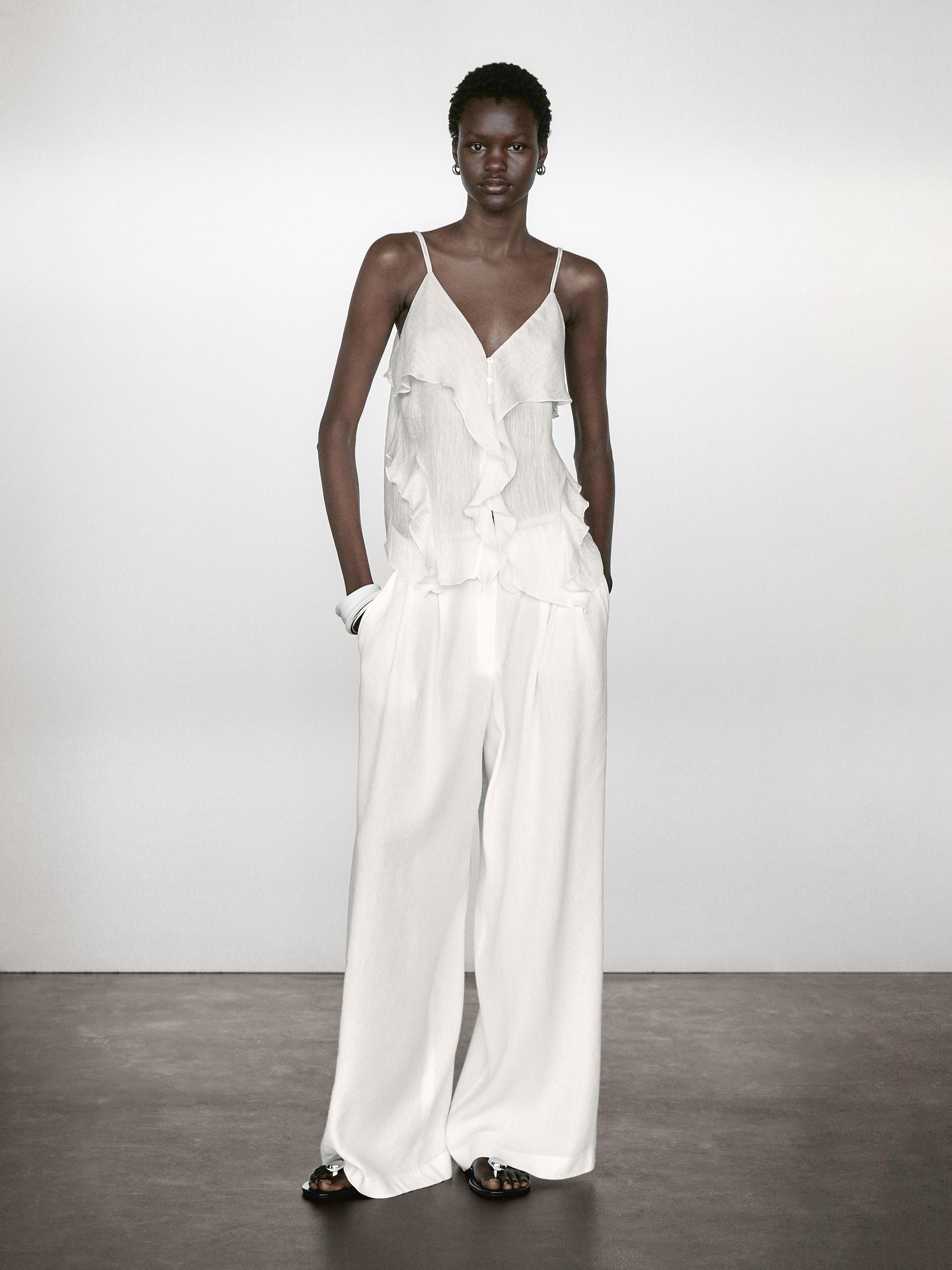 Top sa bretelama i karnerom