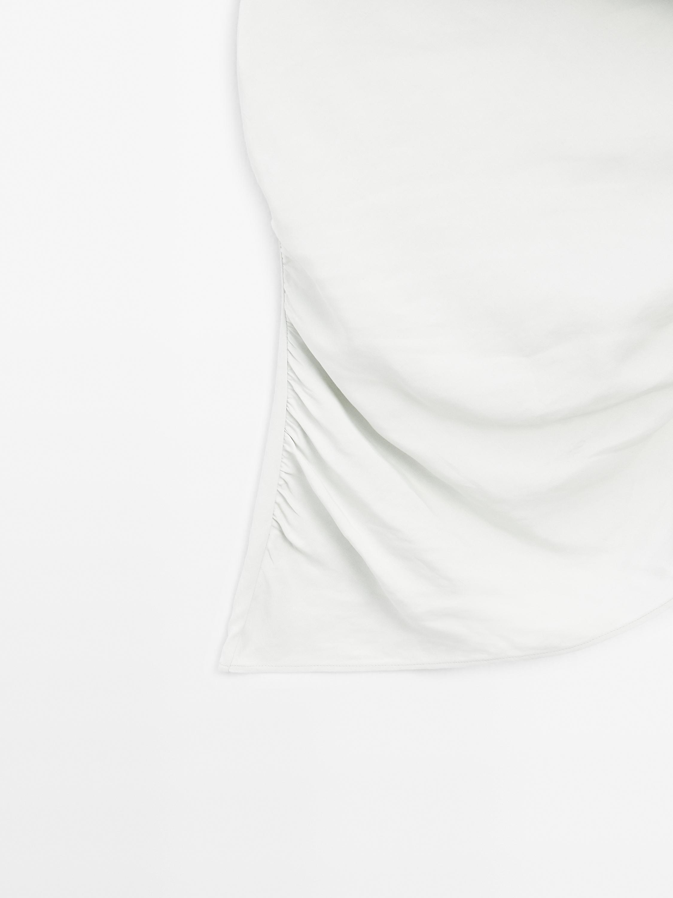 Draped boat neck top