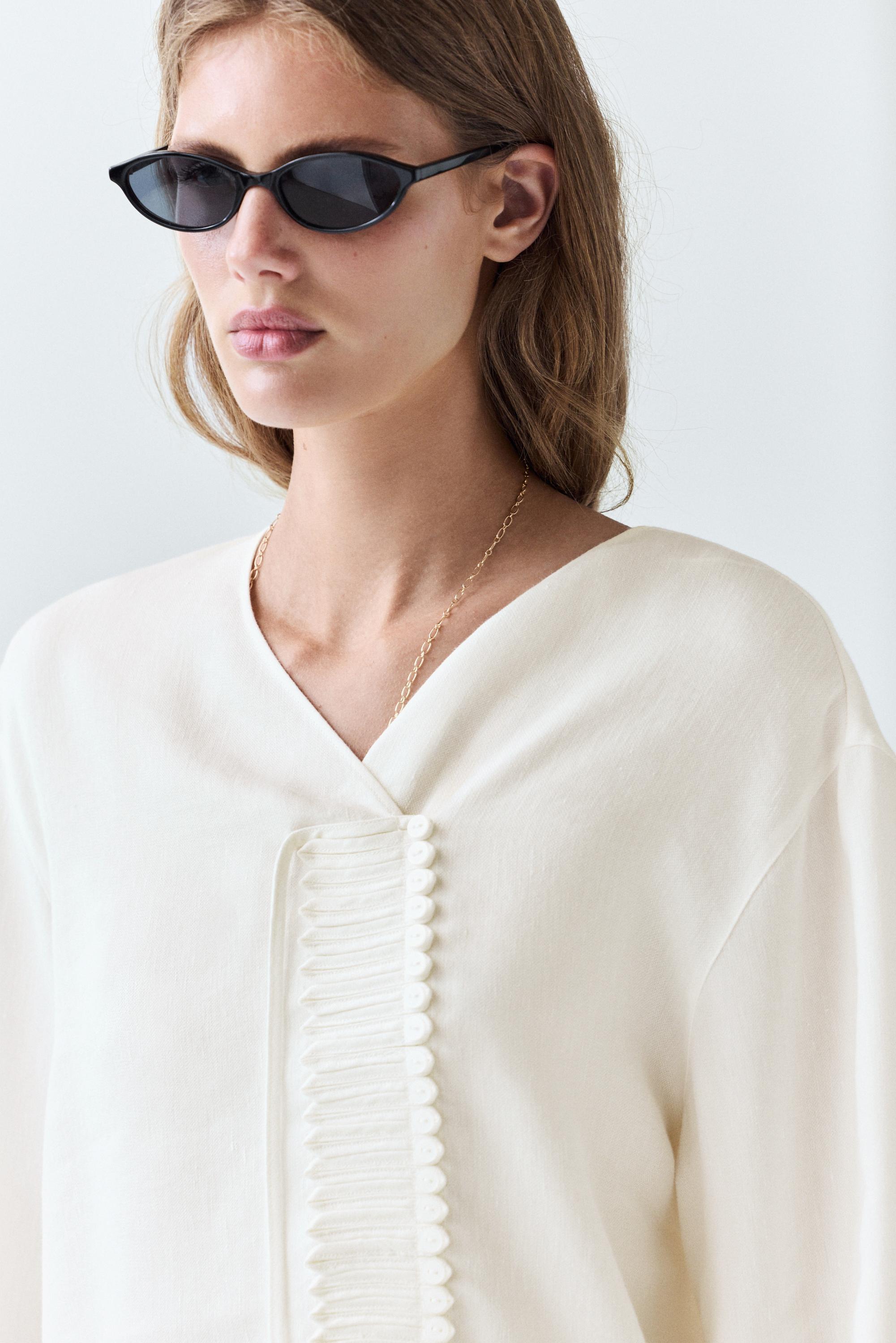 Flowing linen blend blouse with button detail — WHITE