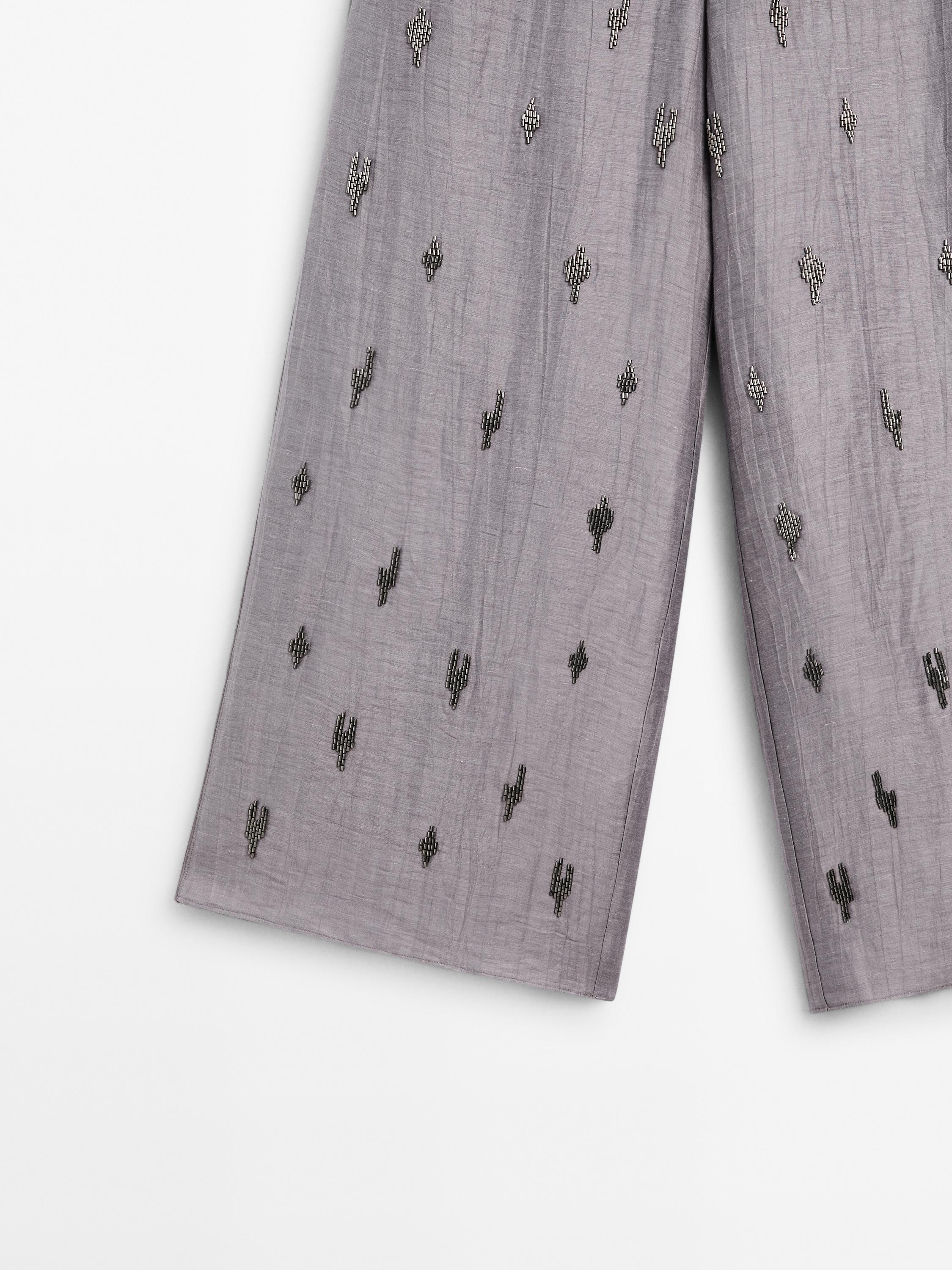 Linen blend trousers with rhinestone detail