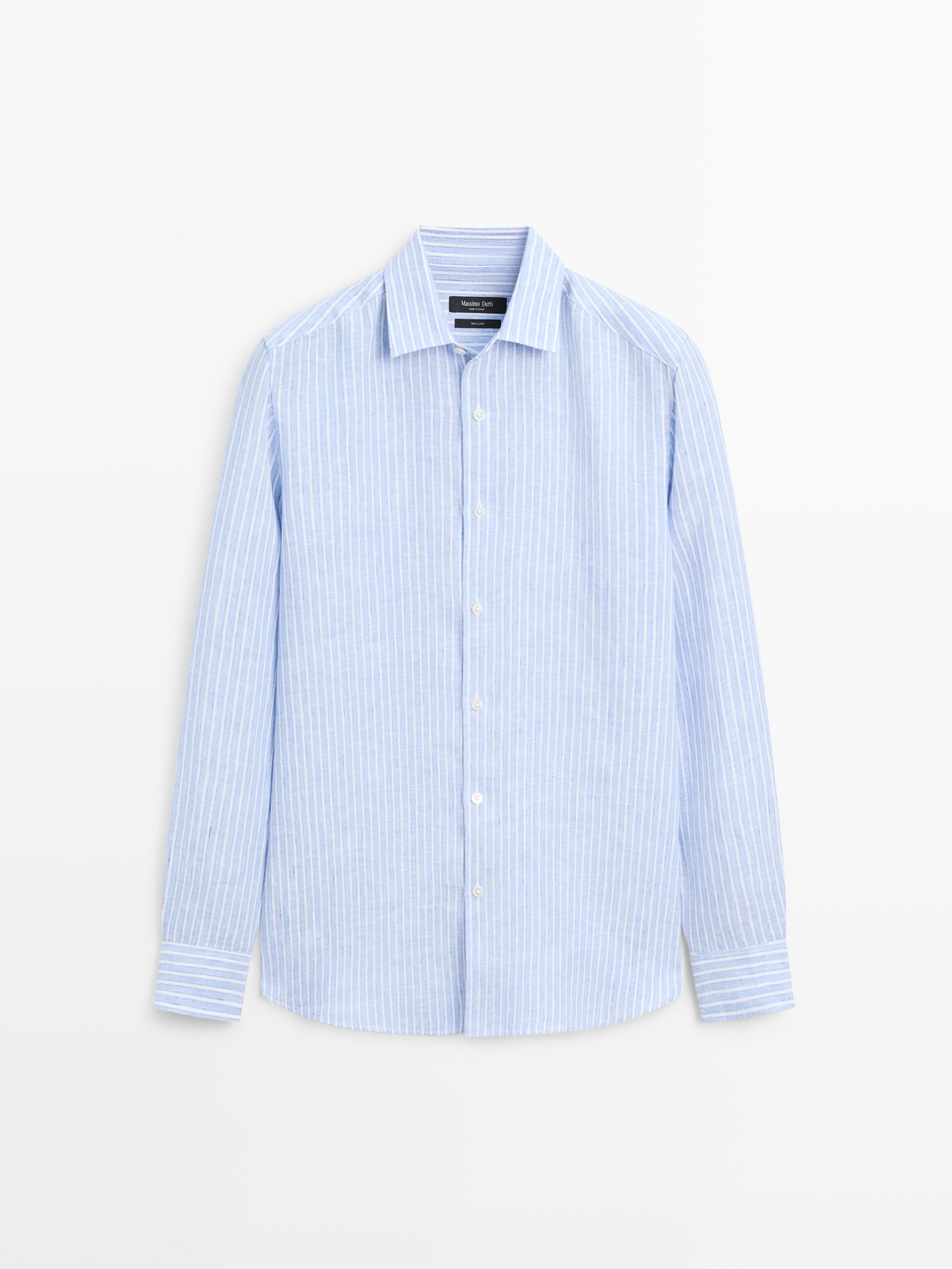 Front view of a light blue shirt with vertical stripes, long sleeves, classic collar, and white button closure.