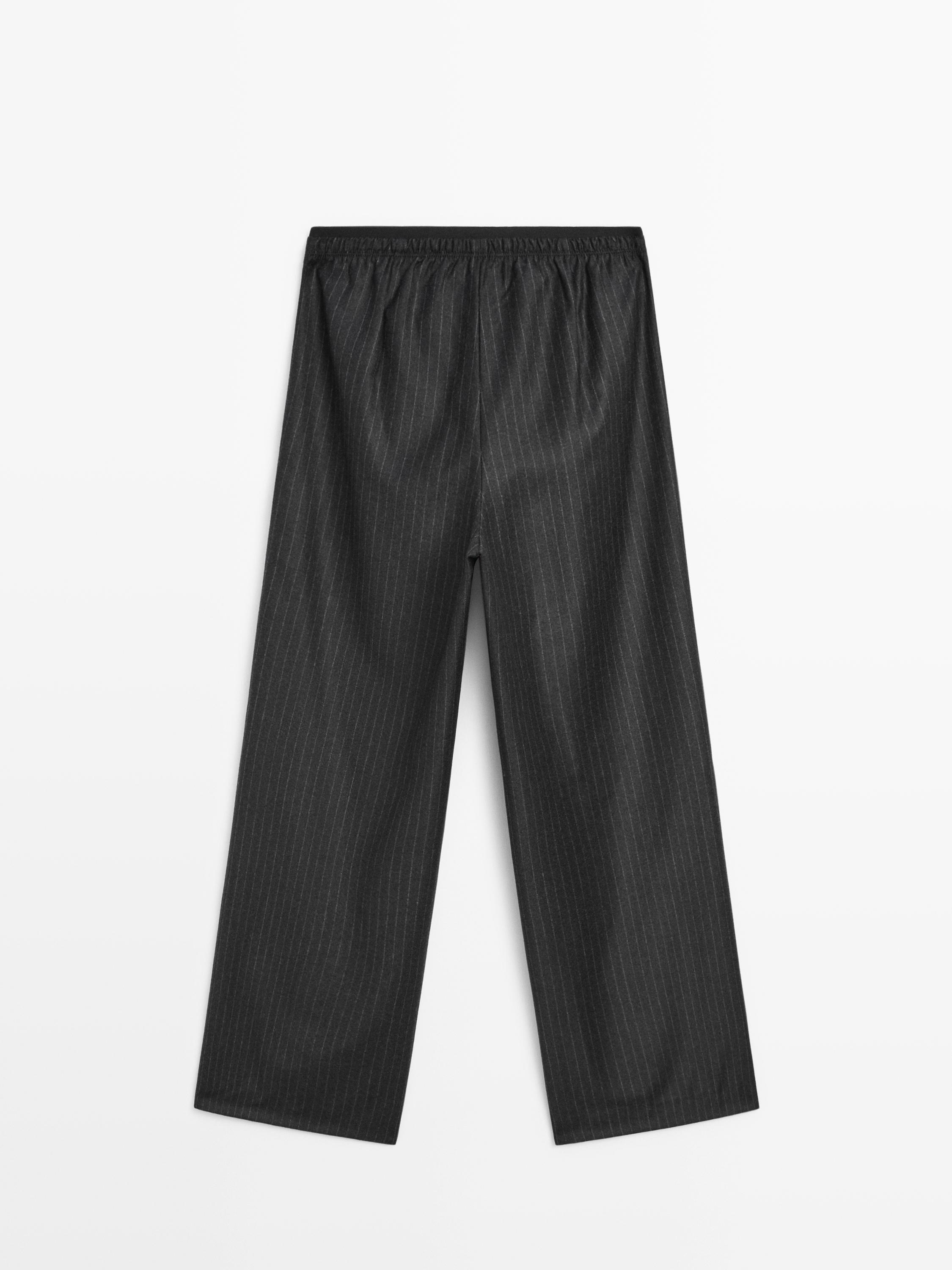 Joggingbroek met krijtstreep en bandplooi