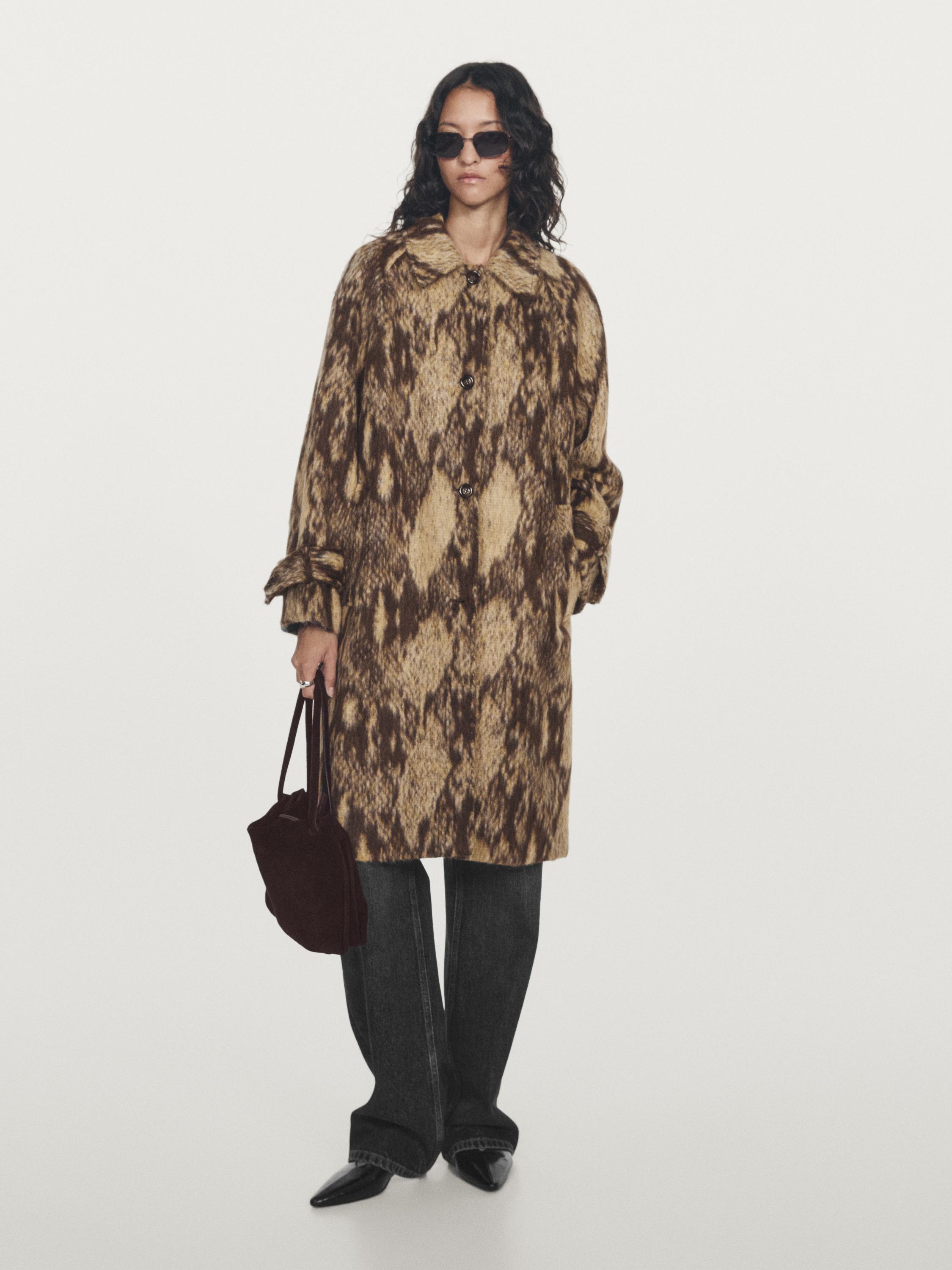Manteau laine long serpent