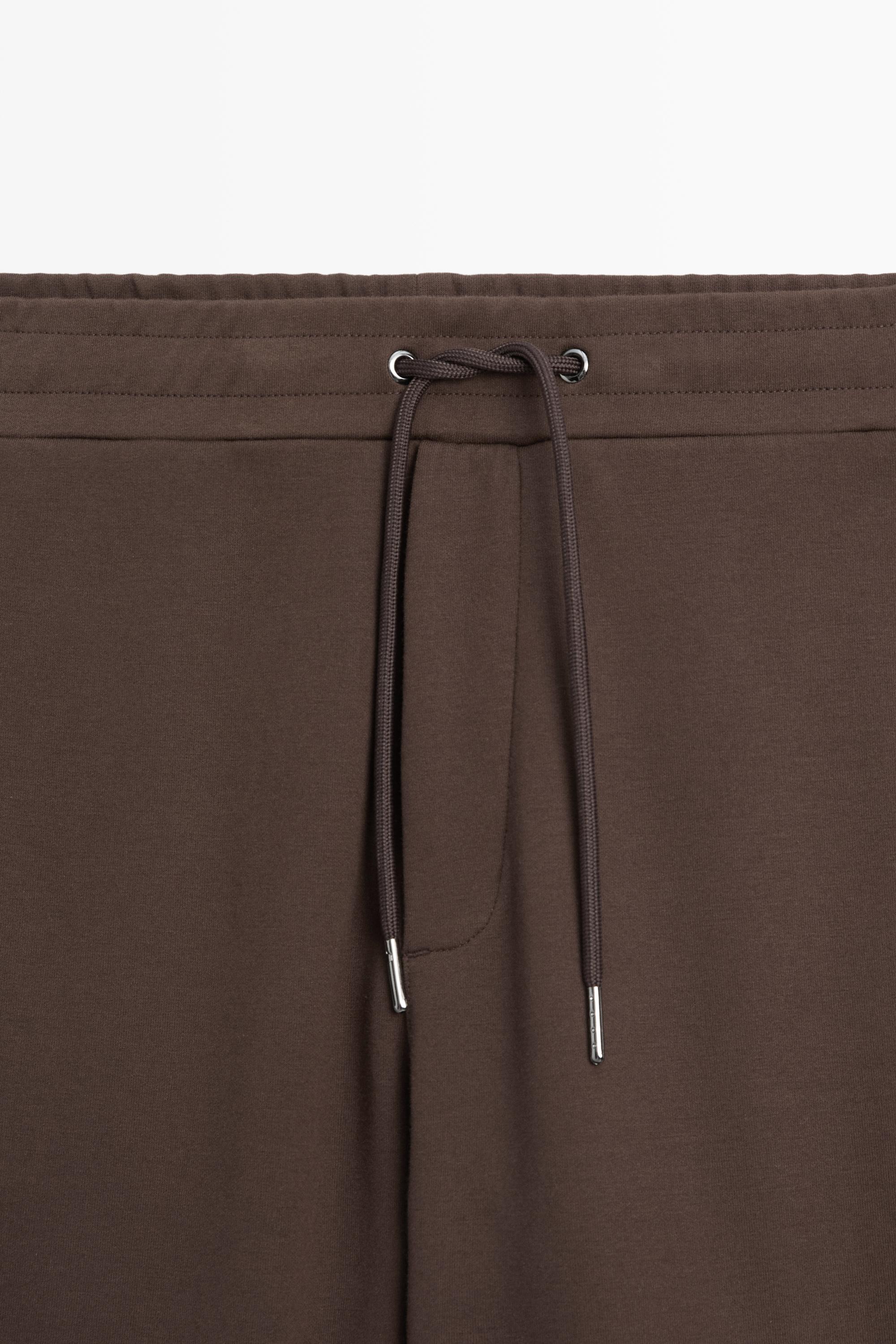 Total look cotton blend jogger fit trousers — BROWN