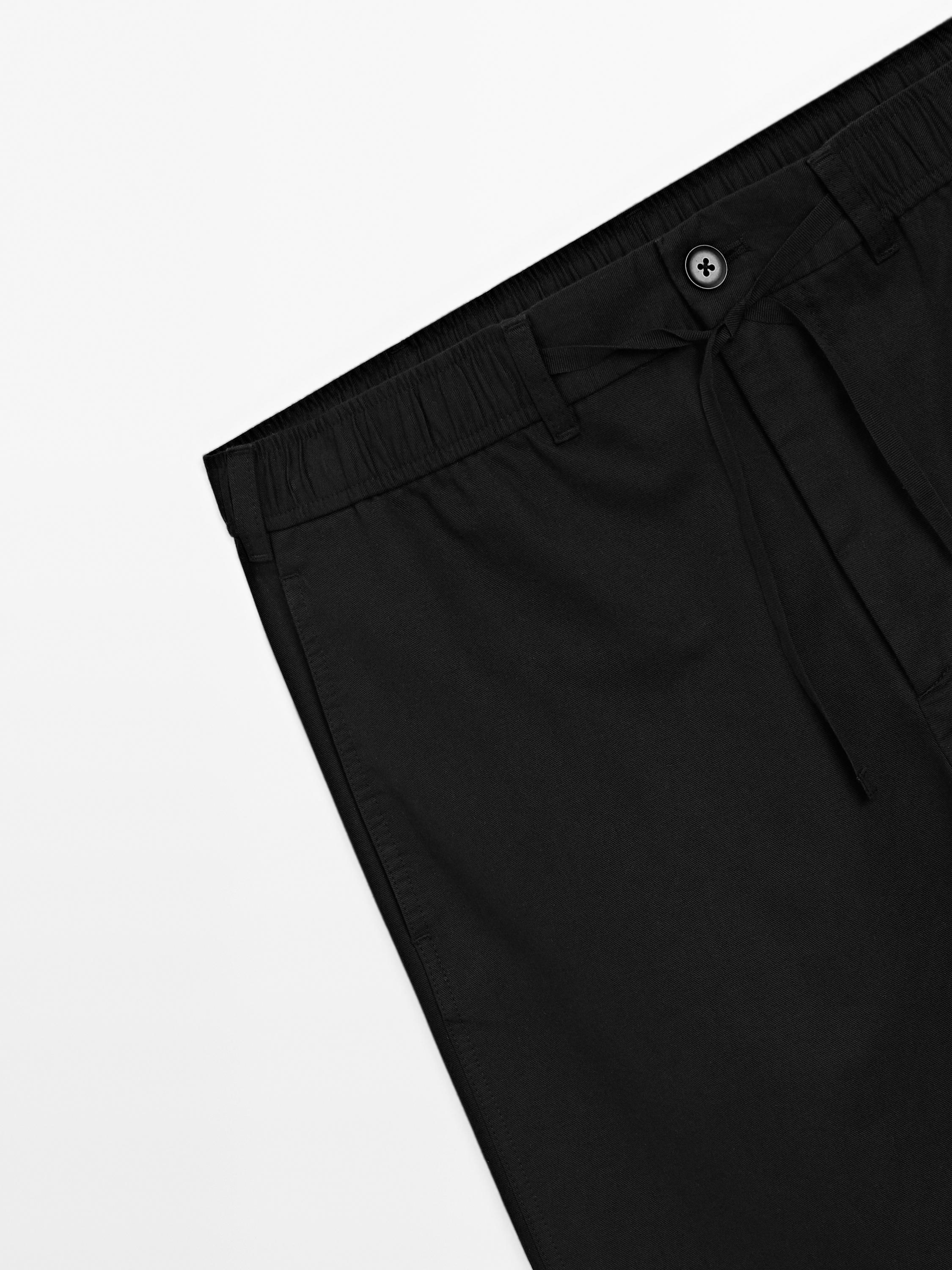 Quần jogger pha cốt-tông