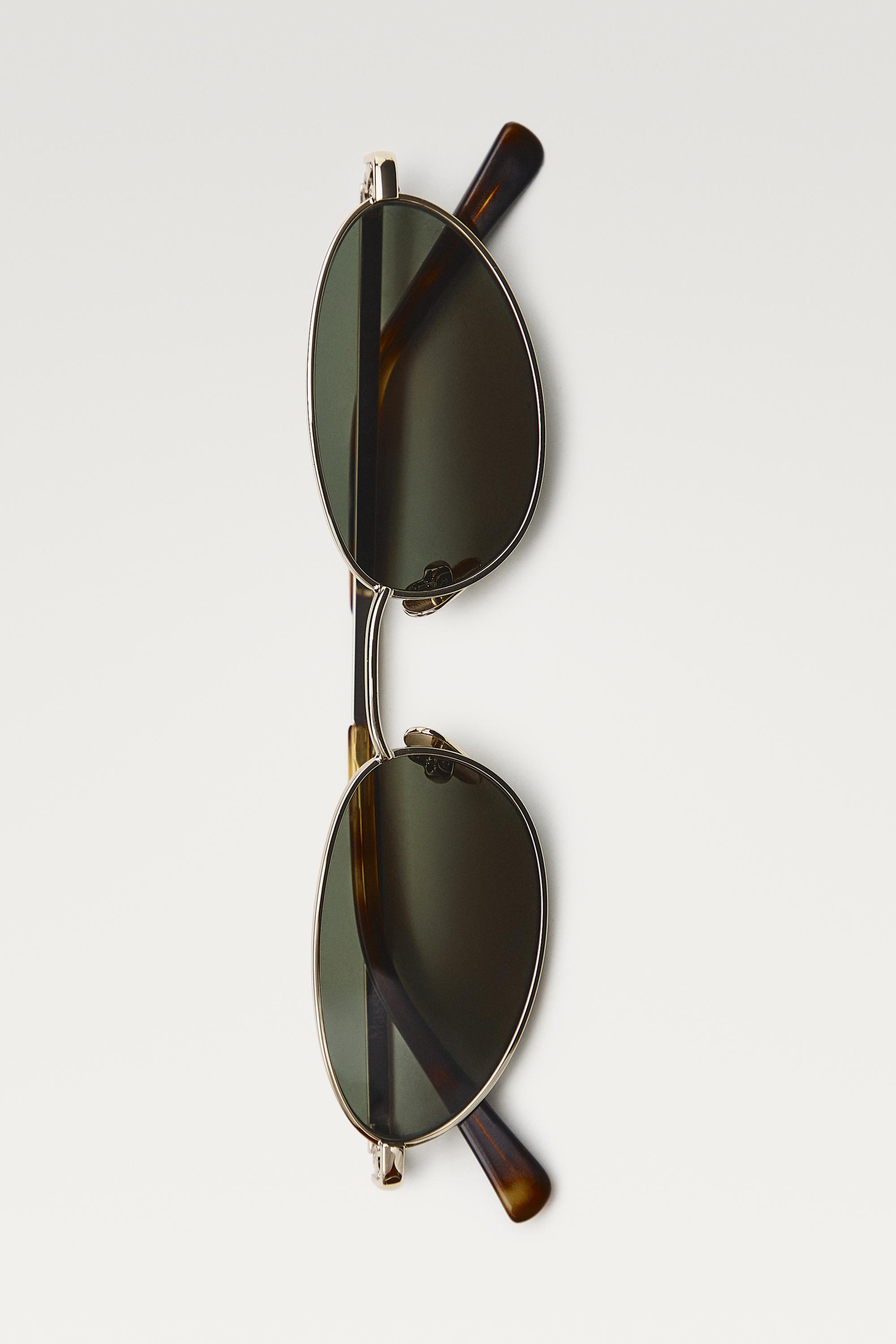 Oval metal sunglasses — GOLDEN