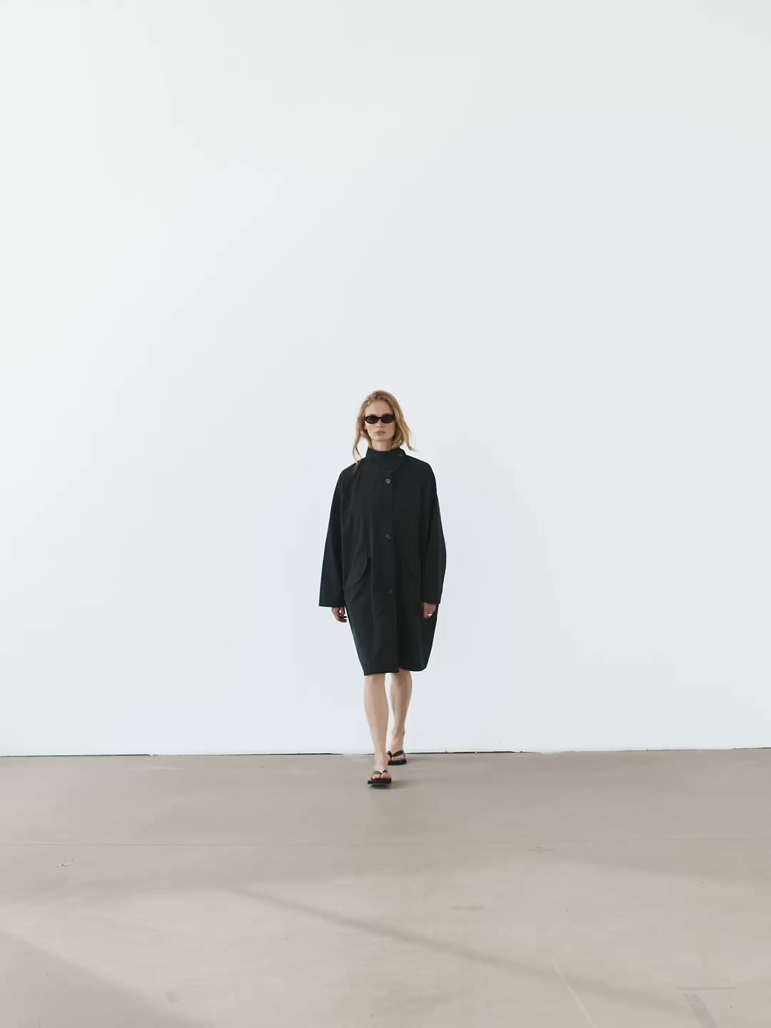 Oversize flowing trench coat in water-repellent fabric