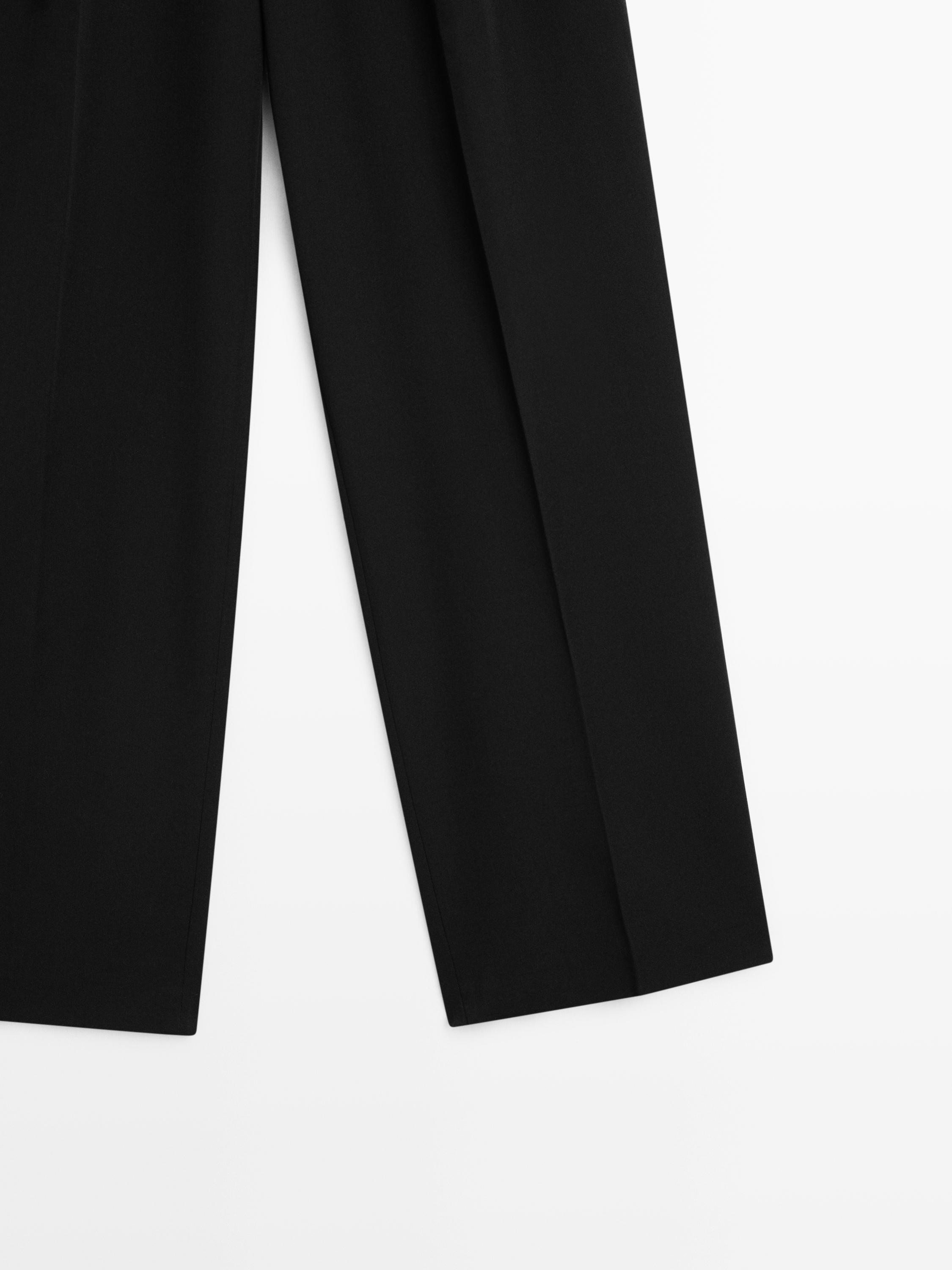 Wide-leg flowing trousers with darts