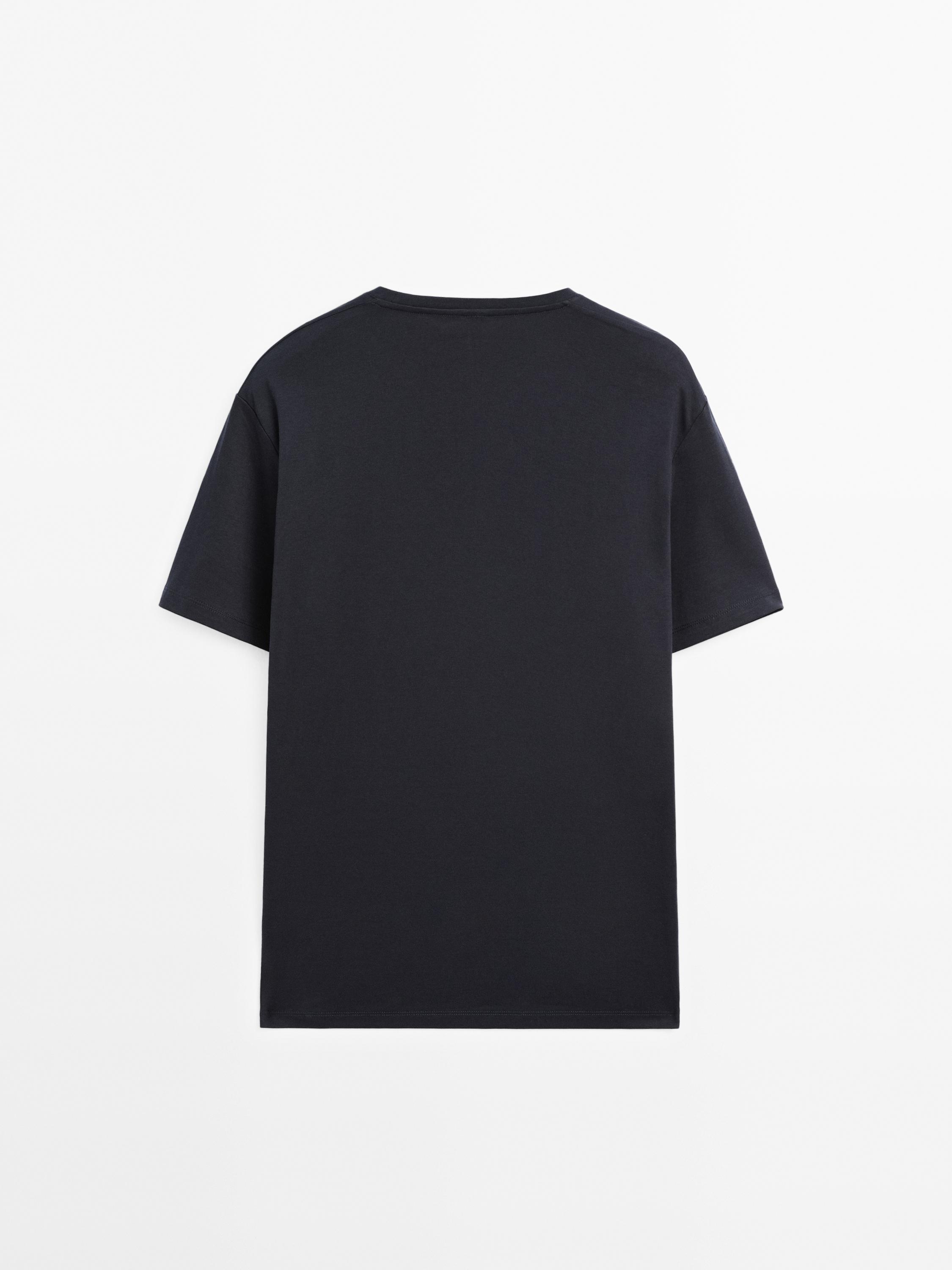 Short sleeve pyjama top and striped trousers