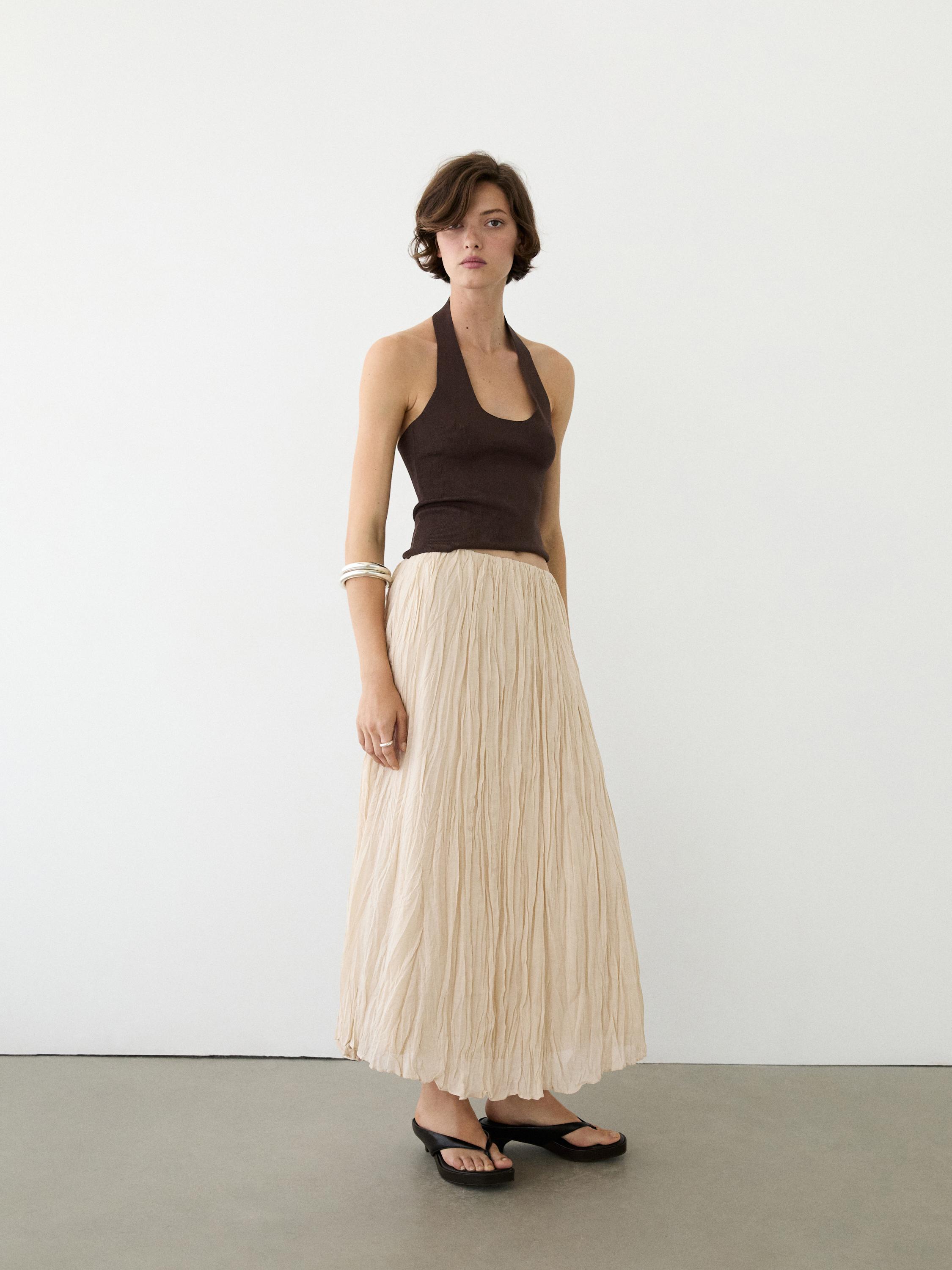 Flowing midi skirt with pleated detail — CREAM