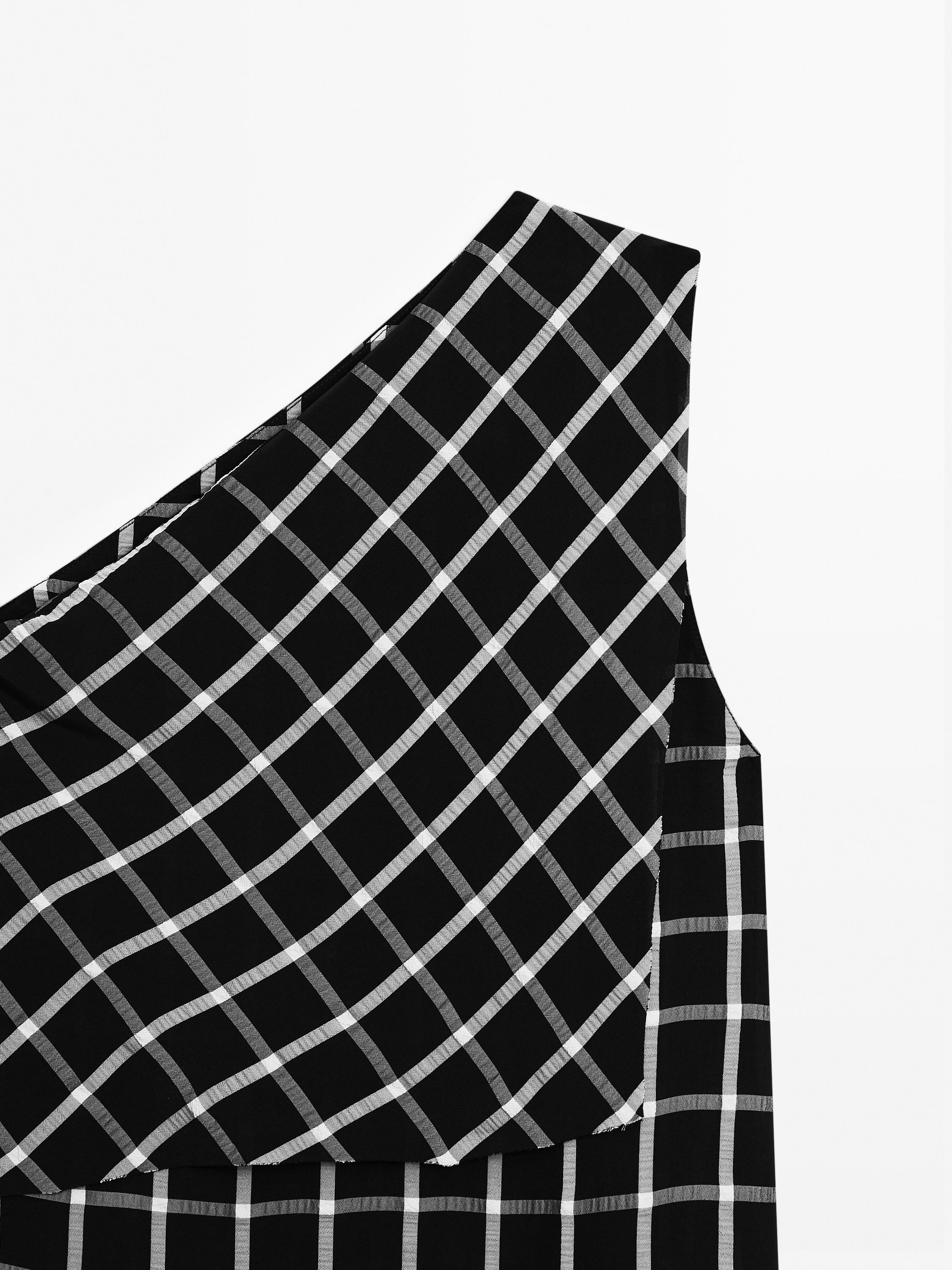 Checked top with asymmetric neckline