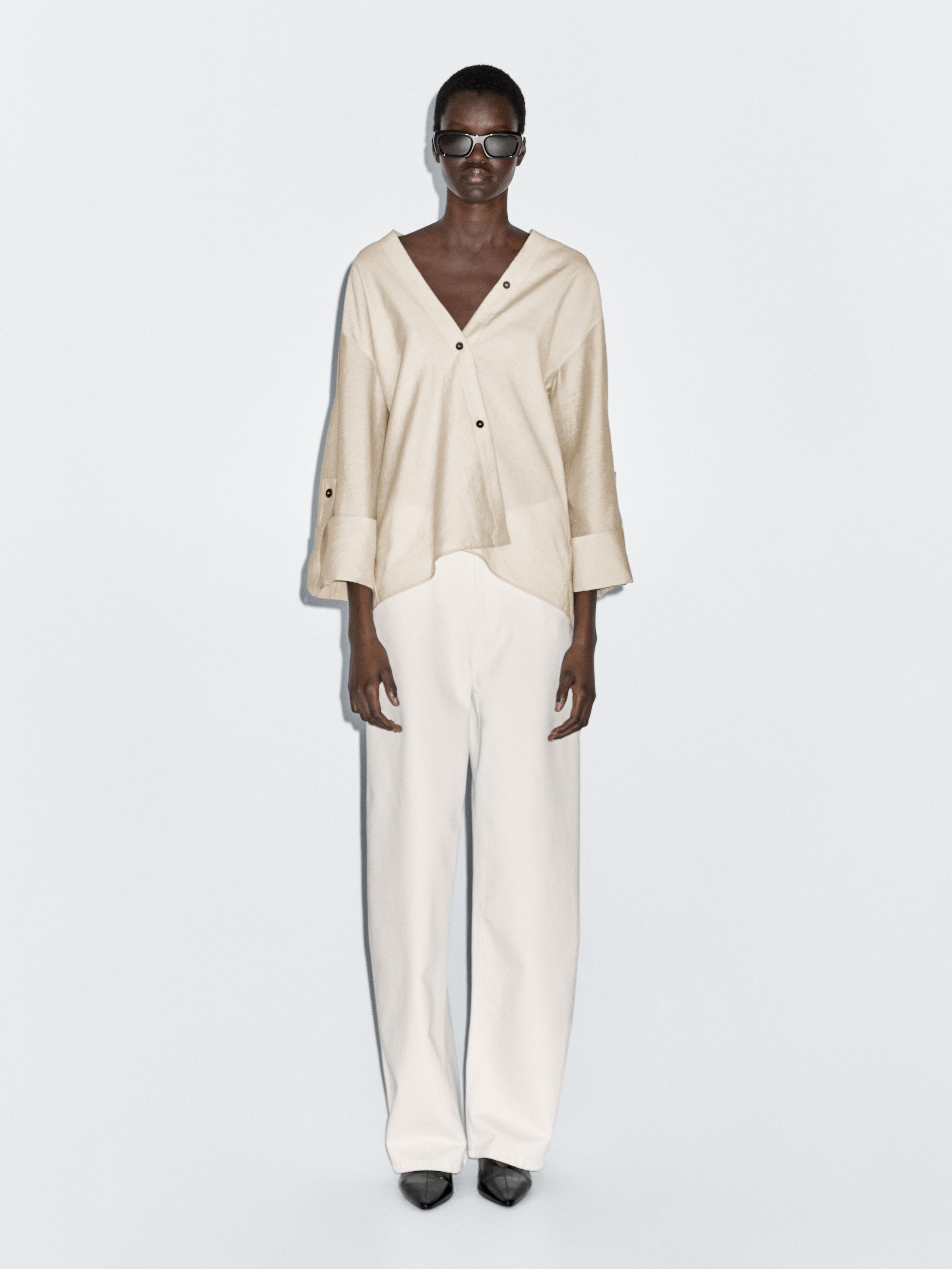 Košulja sa podvrnutim rukavima