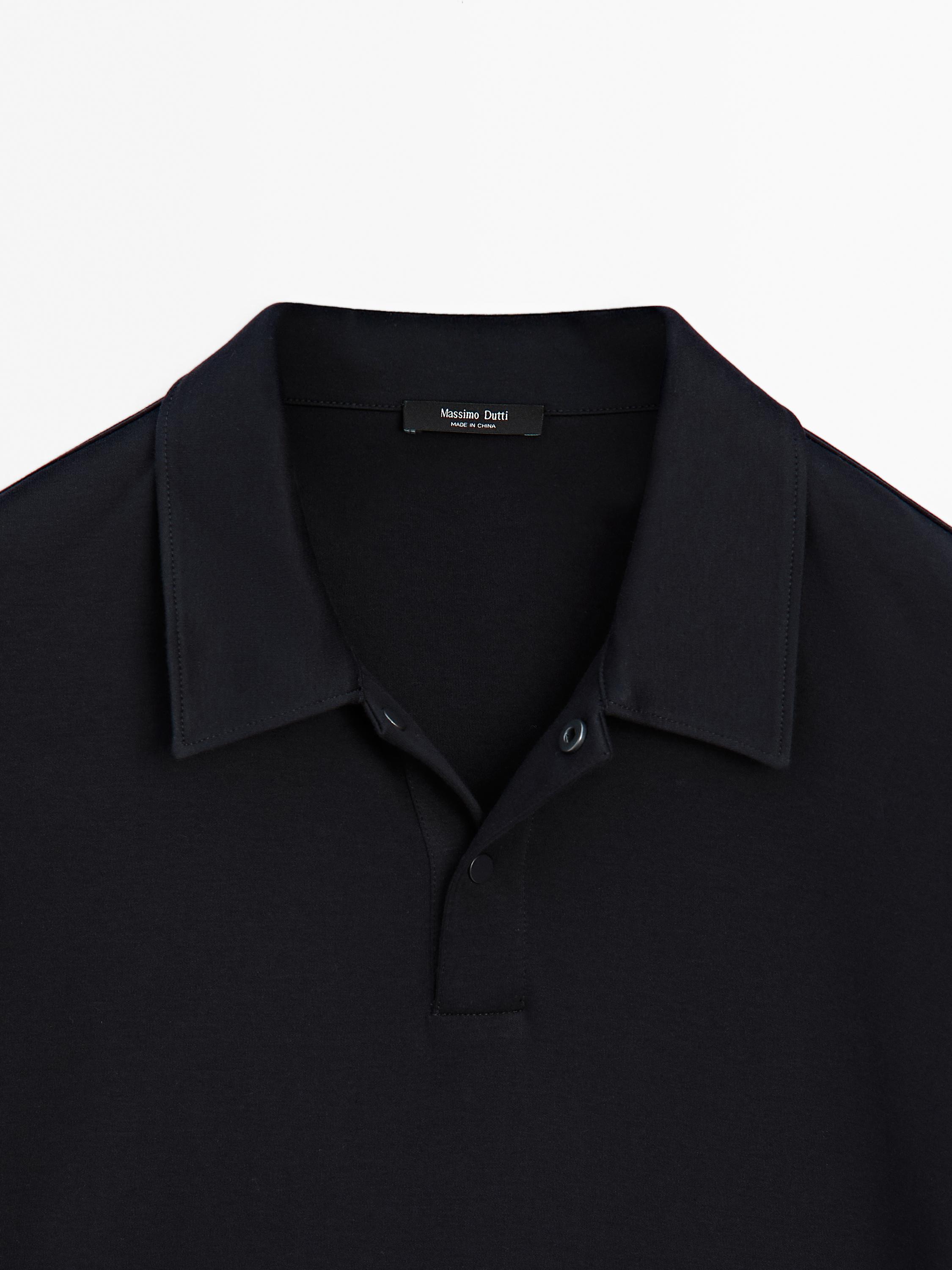 Short sleeve polo shirt with snap-button placket