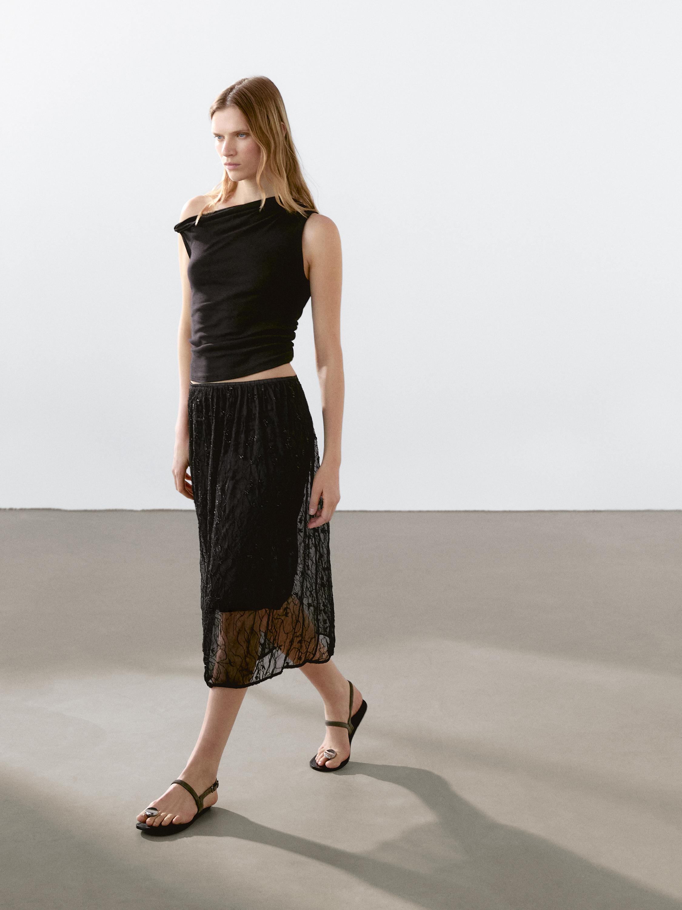 Halbtransparenter Midirock mit Strass