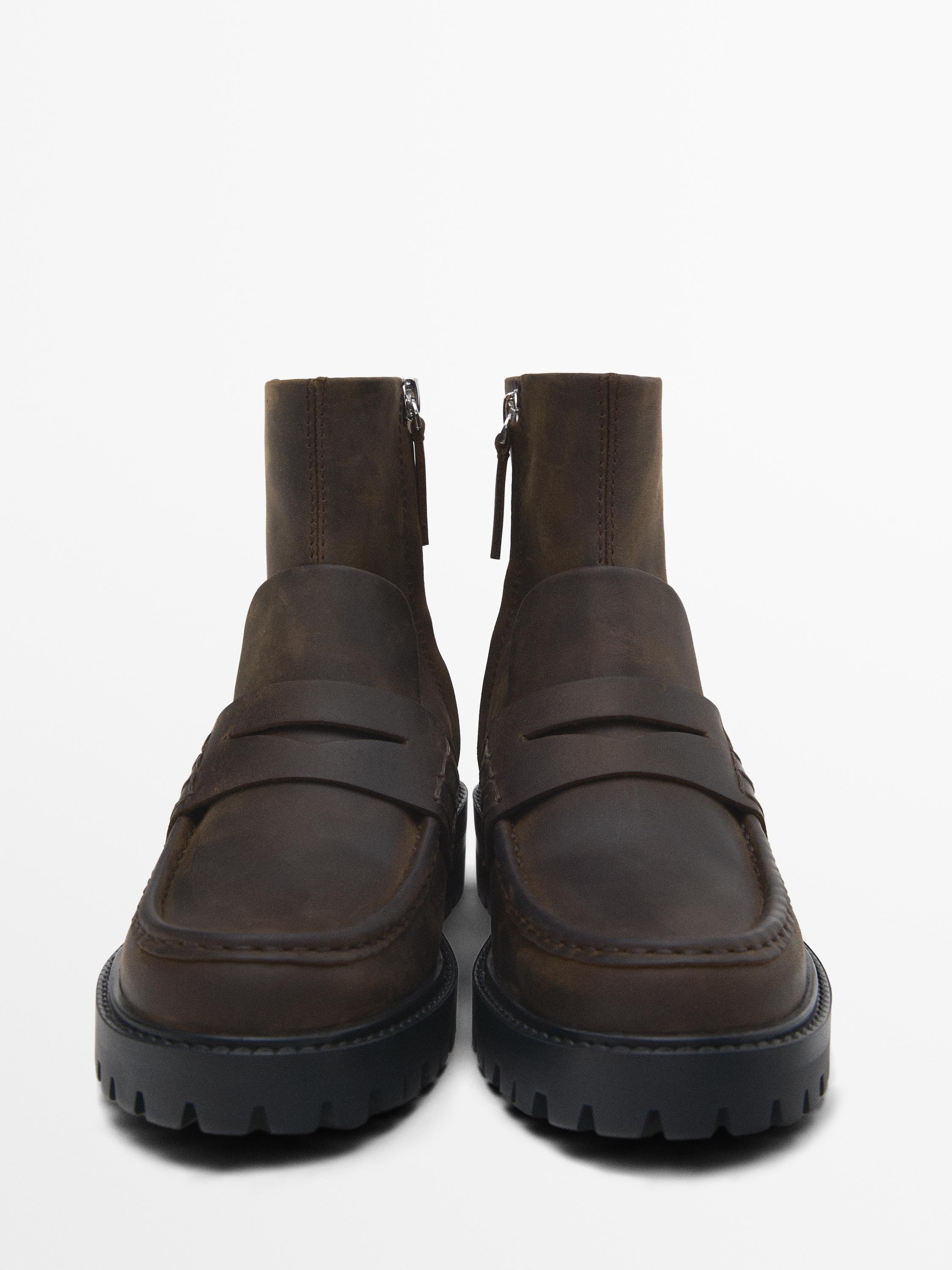 Track sole ankle boots with penny strap