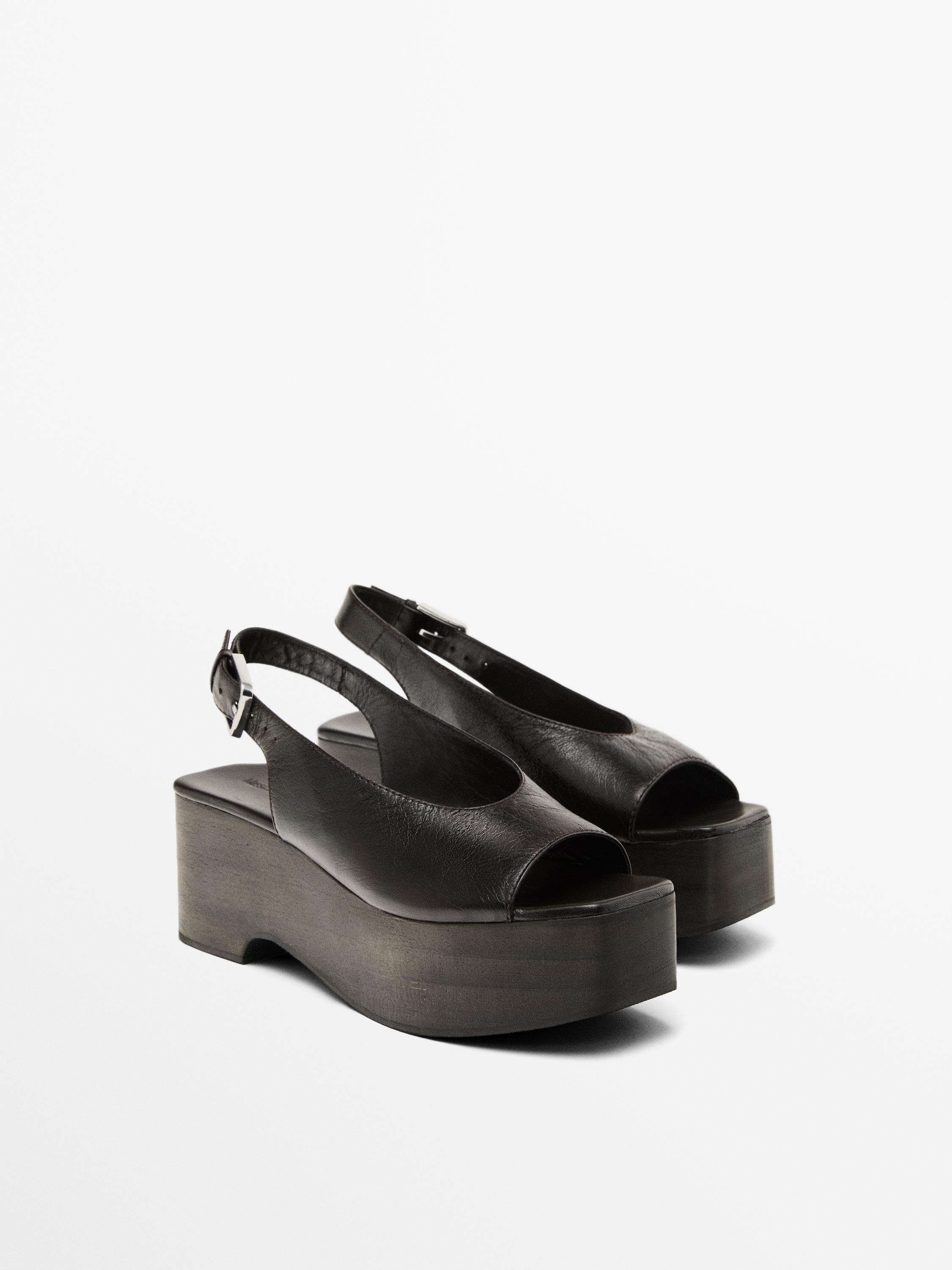 Босоножки на деревянной танкетке