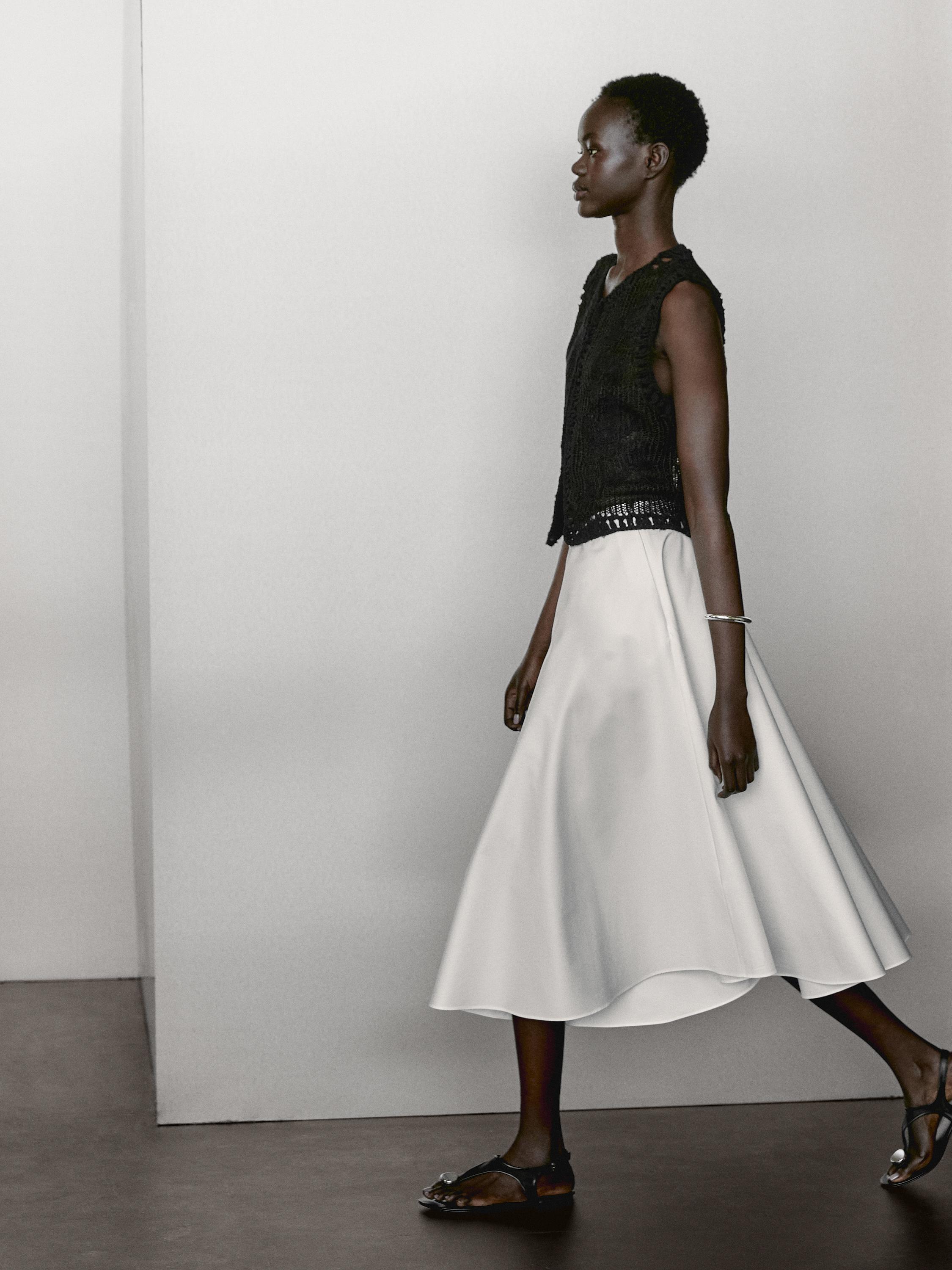 Knit vest with embroidered detail